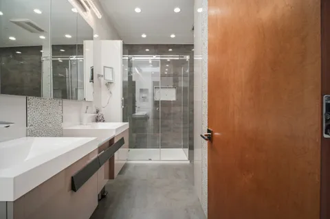 a view of storage and utility room with washer and dryer