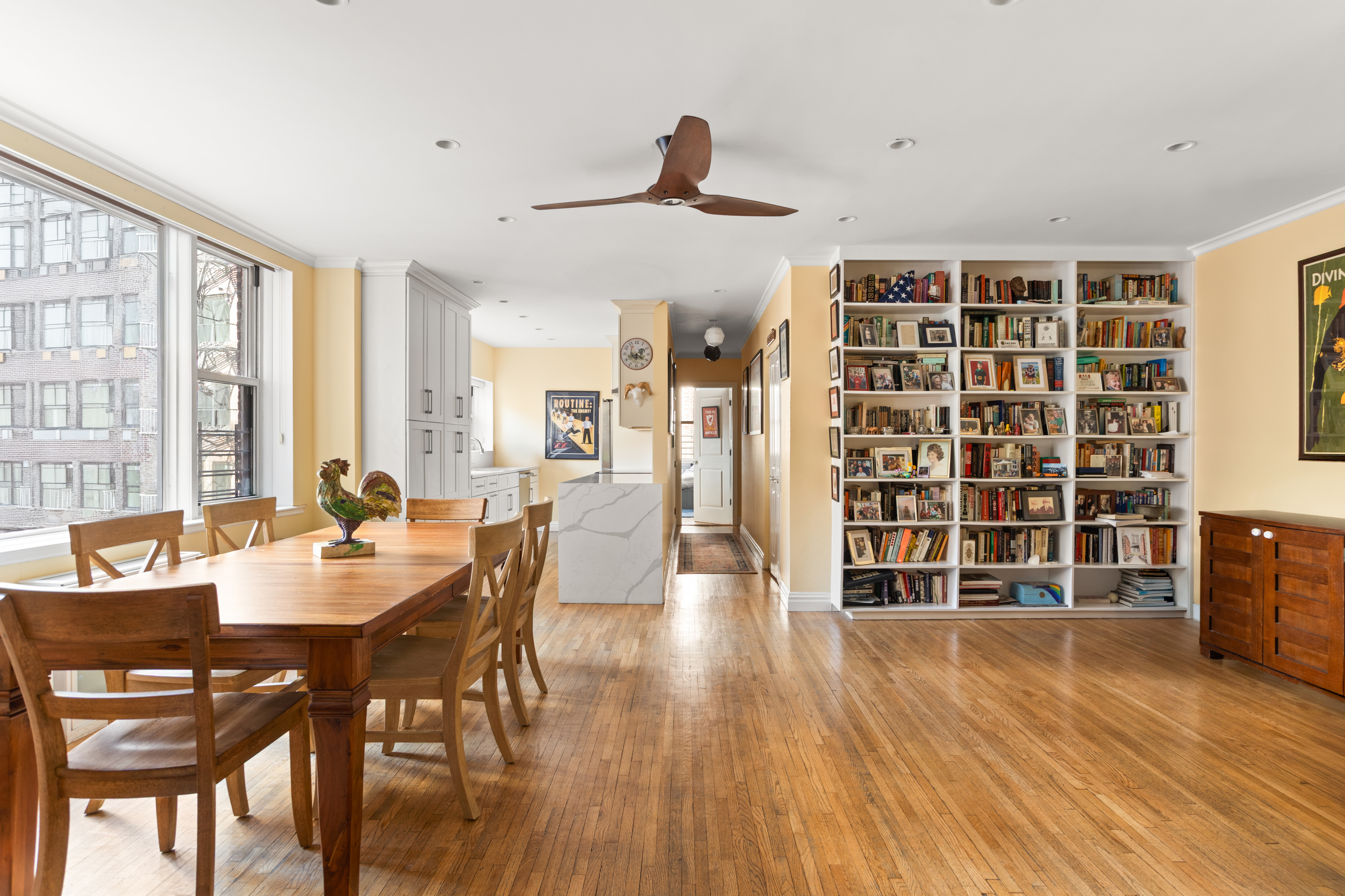 161 East 90th Street, Unit 5C Manhattan, NY 10128 - Photo 4 of 14 a view of a dining room with furniture and wooden floor