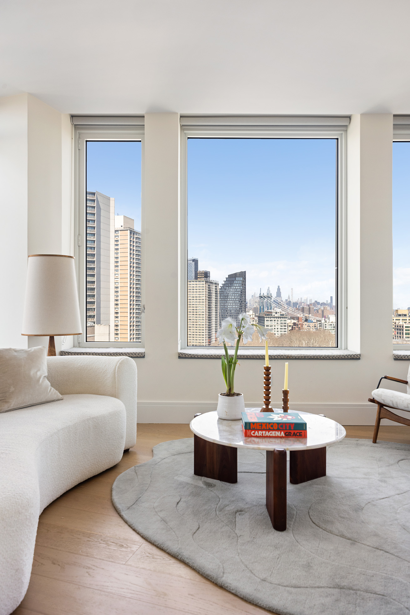 1 Clinton Street, Unit 12A Brooklyn, NY 11201 - Photo 5 of 29 a living room with furniture and a window