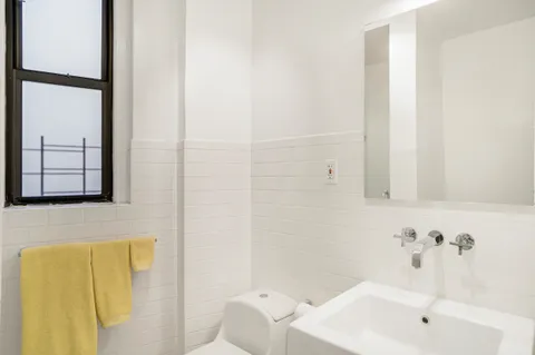 a bathroom with a sink and a bathtub