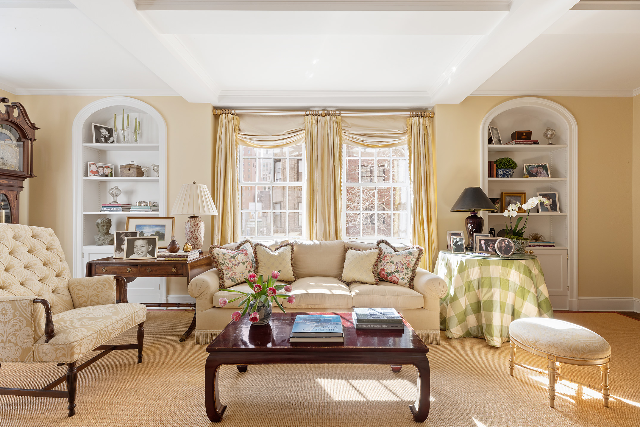 133 East 80th Street, Unit 3A Manhattan, NY 10075 - Photo 2 of 19 a living room with furniture and a large window