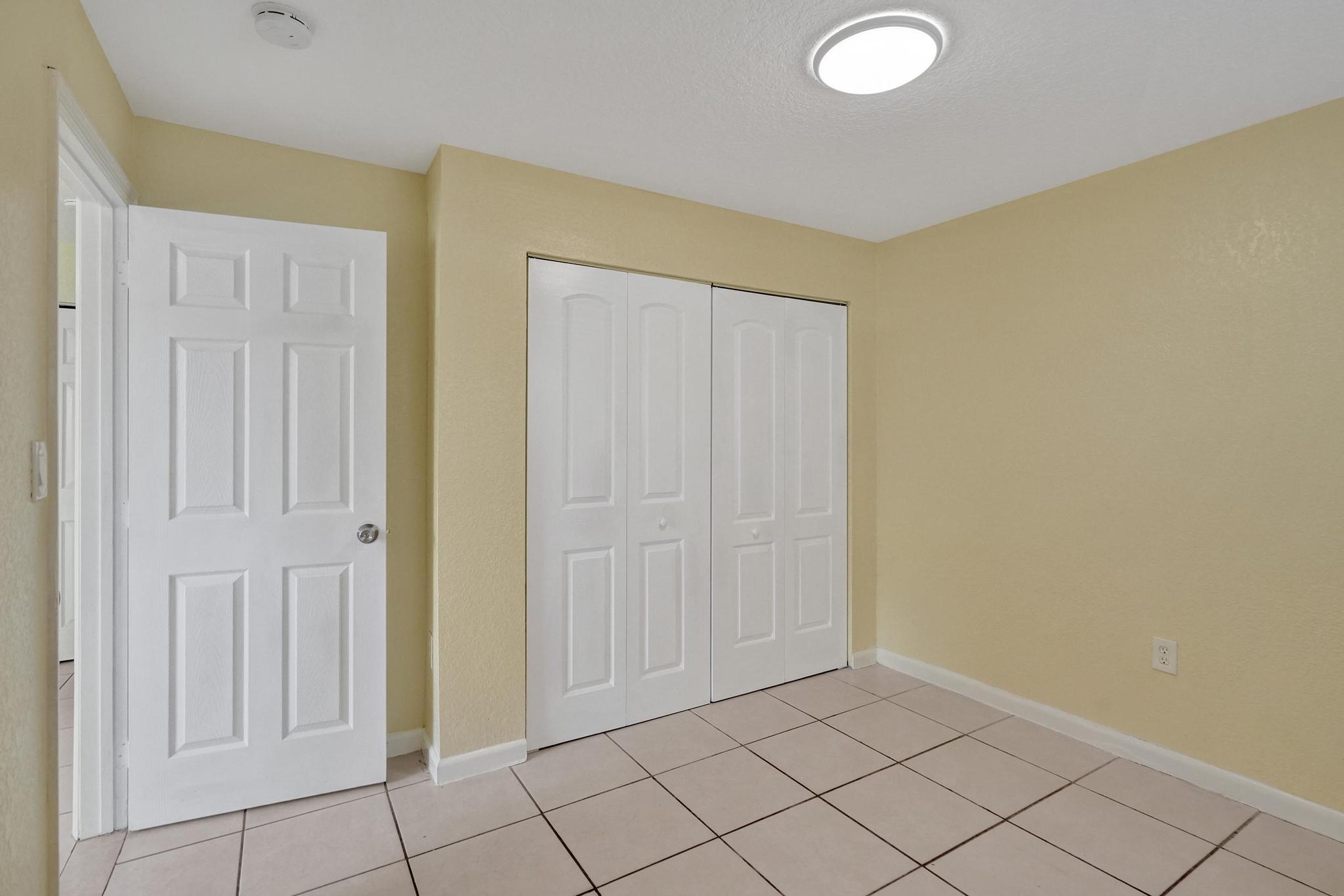 1101 Prospect Road Fort Lauderdale, FL 33309 - Photo 26 of 34 an empty room with windows