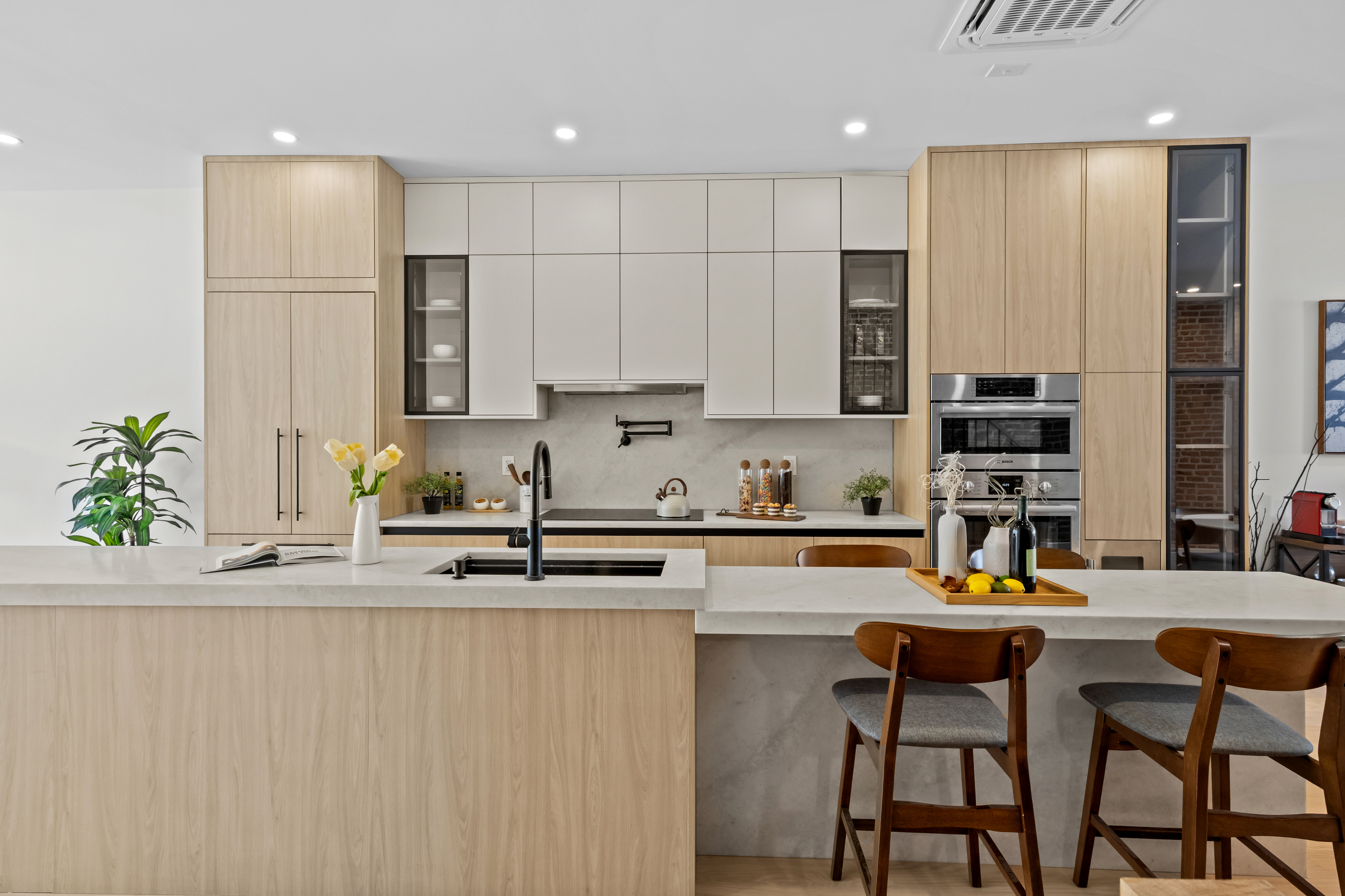 320 10th Street Brooklyn, NY 11215 - Photo 4 of 41 a kitchen with stainless steel appliances granite countertop a stove a sink a refrigerator white cabinets and a granite counter top