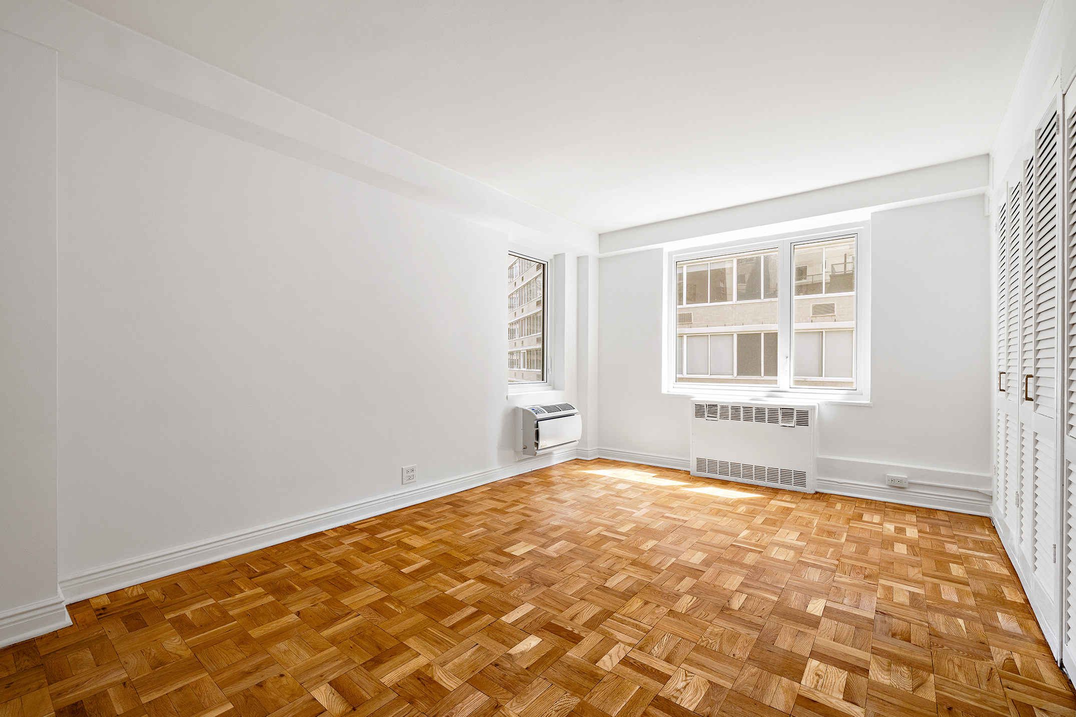 411 East 53rd Street, Unit 12D Manhattan, NY 10022 - Photo 10 of 15 a view of an empty room
