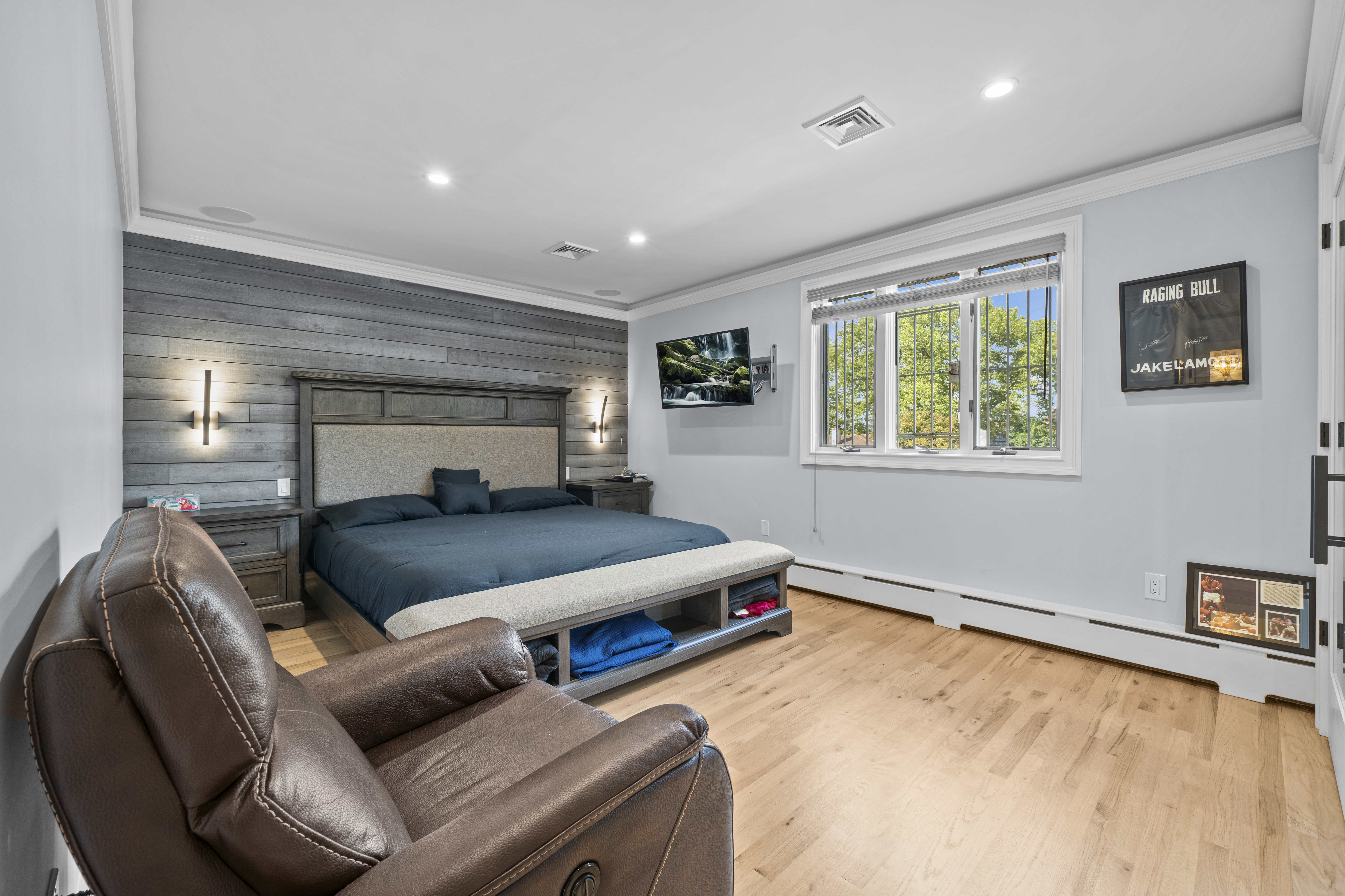 2253 East 64th Street Brooklyn, NY 11234 - Photo 23 of 45 a living room with furniture and a window