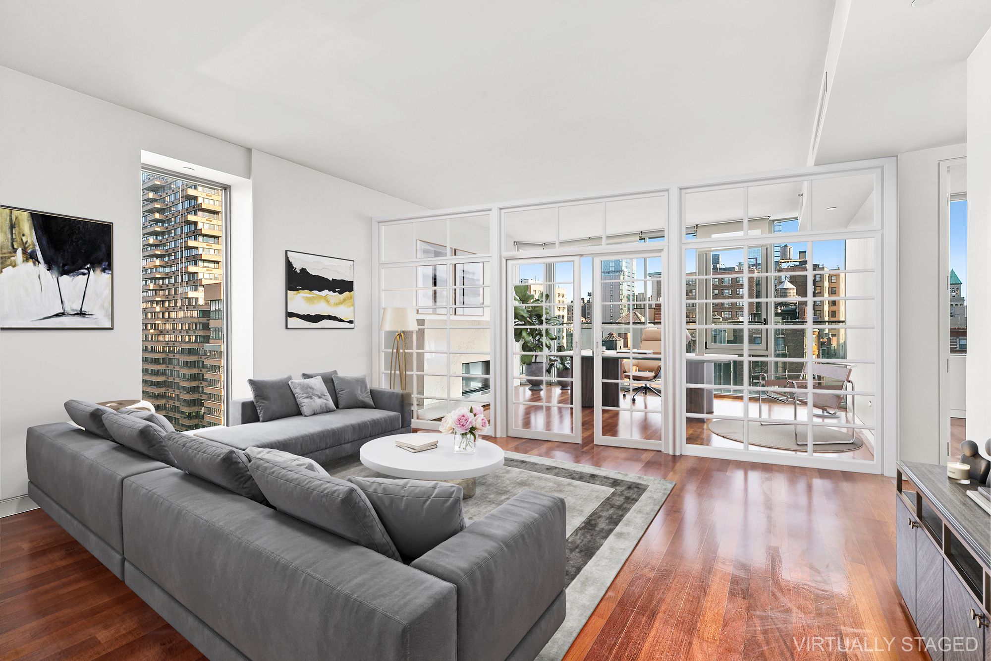 210 West 96th Street, Unit 6 Manhattan, NY 10025 - Photo 2 of 14 a living room with furniture and a wooden floor