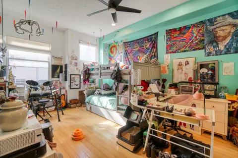 a bathroom with a sink mirror and a