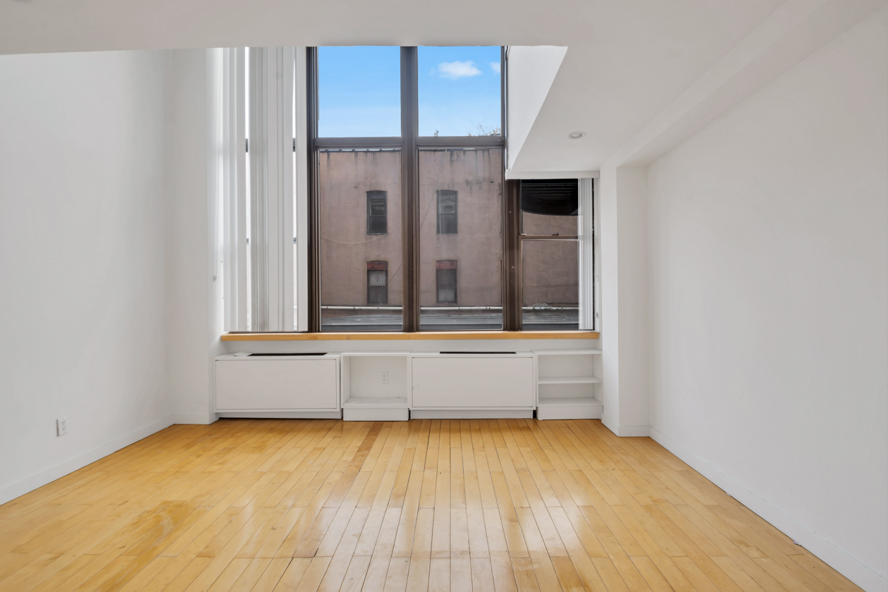 65 Cooper Square, Unit 3D Manhattan, NY 10003 - Photo 2 of 11 a view of room with window
