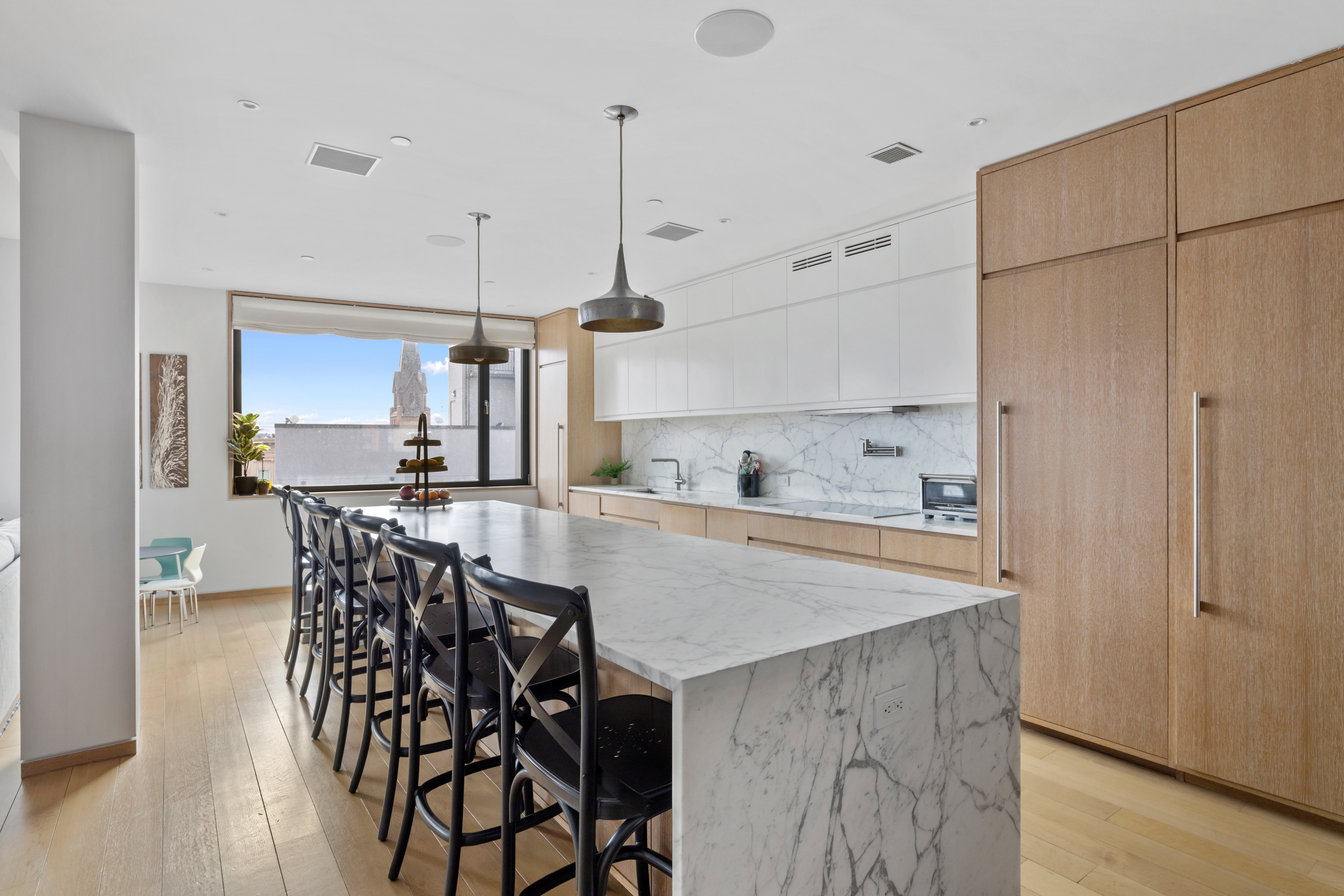 210 Pacific Street, Unit 6 Brooklyn, NY 11201 - Photo 7 of 20 a view of a kitchen and kitchen island