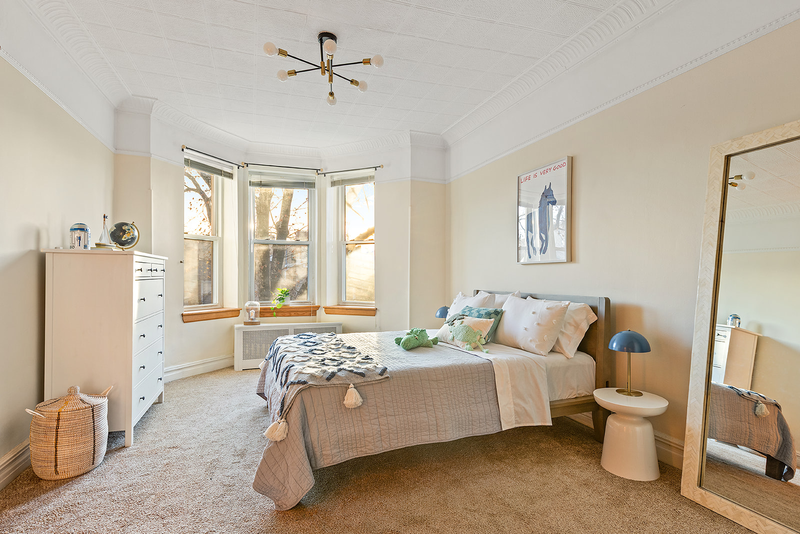 521 84th Street Brooklyn, NY 11209 - Photo 7 of 19 a spacious bedroom with a bed and a window