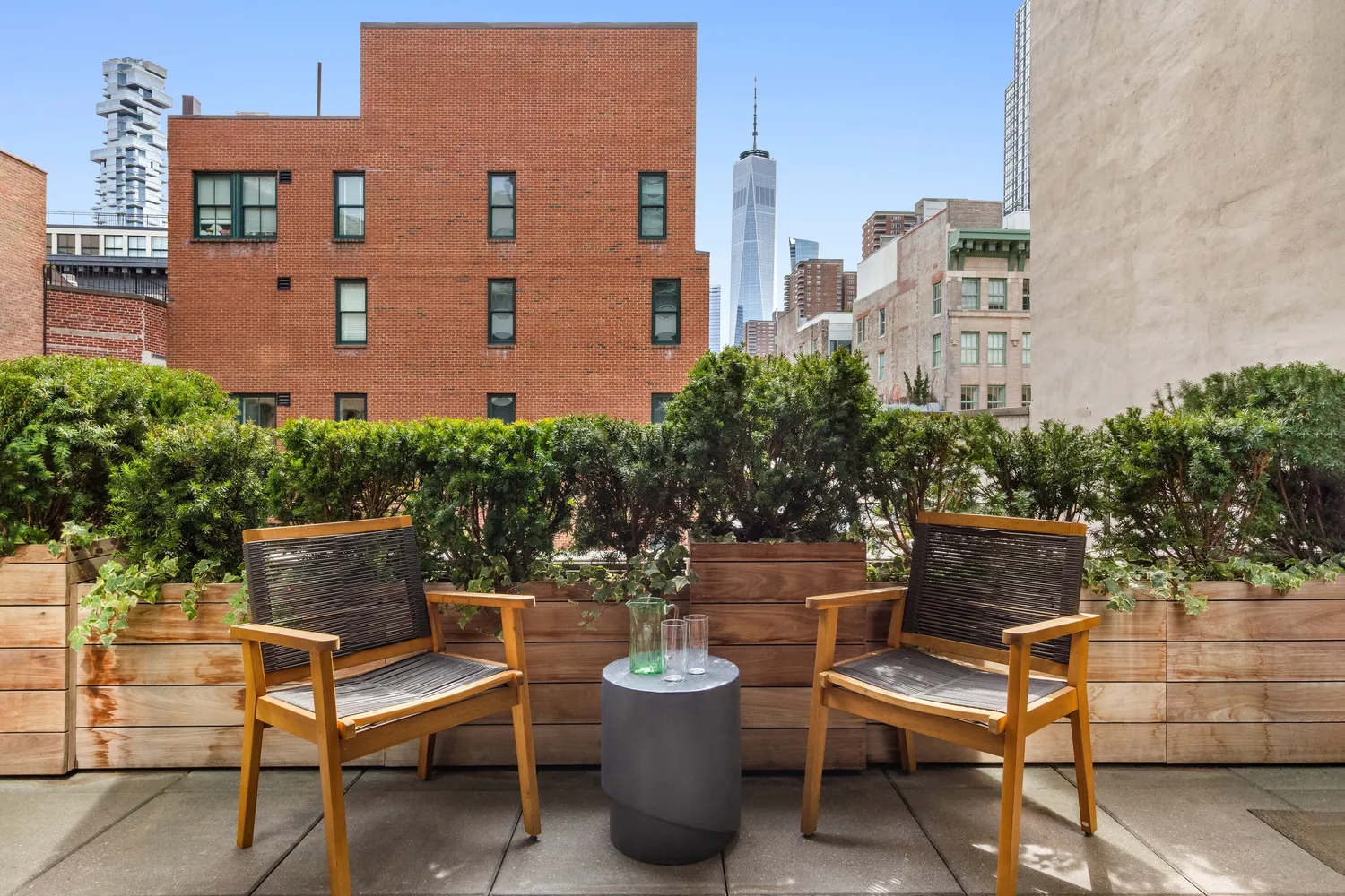 a view of a chairs and table in a patio