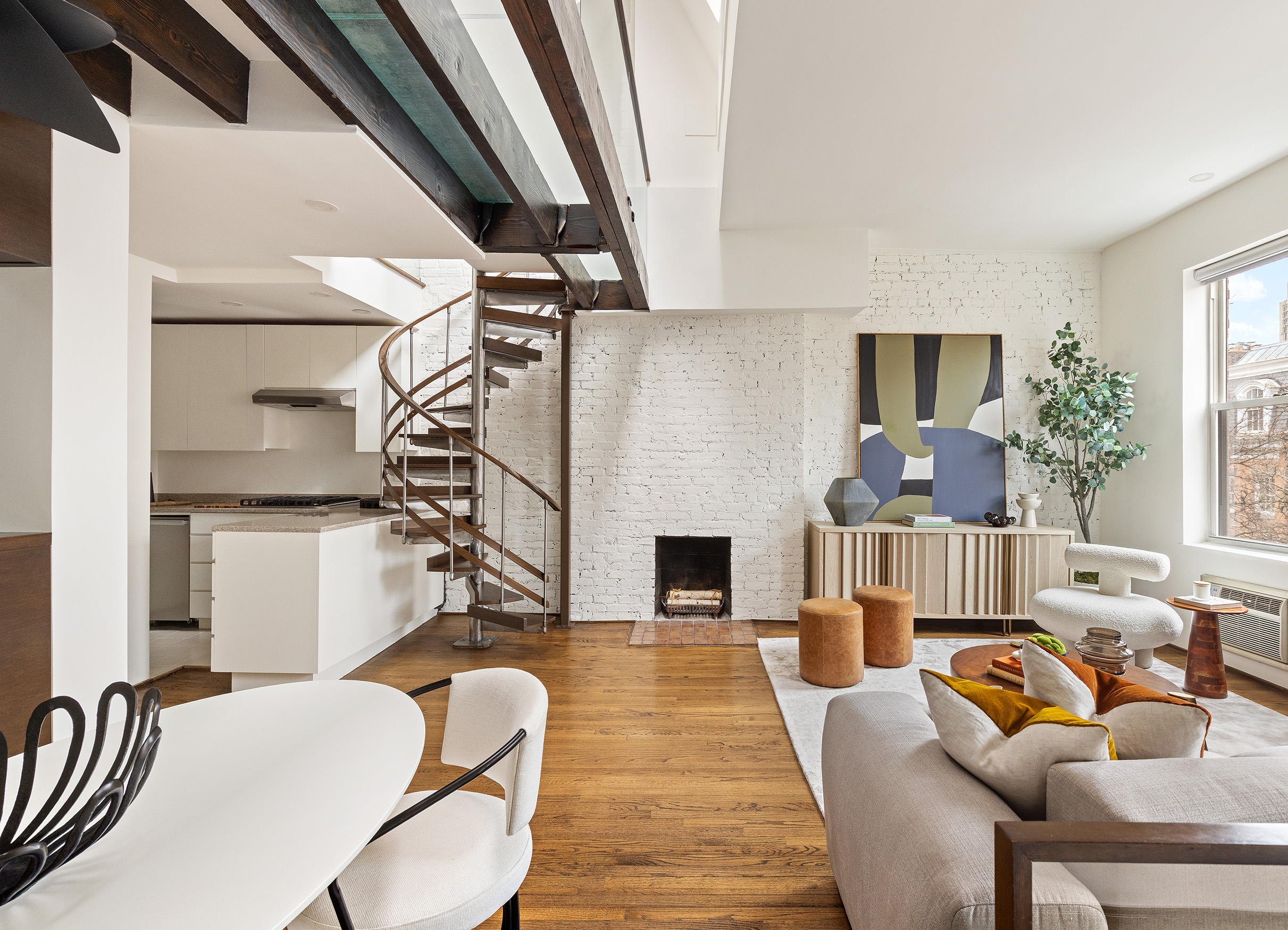 333 West 22nd Street, Unit 5A Manhattan, NY 10011 - Photo 3 of 12 a living room with furniture and a fireplace