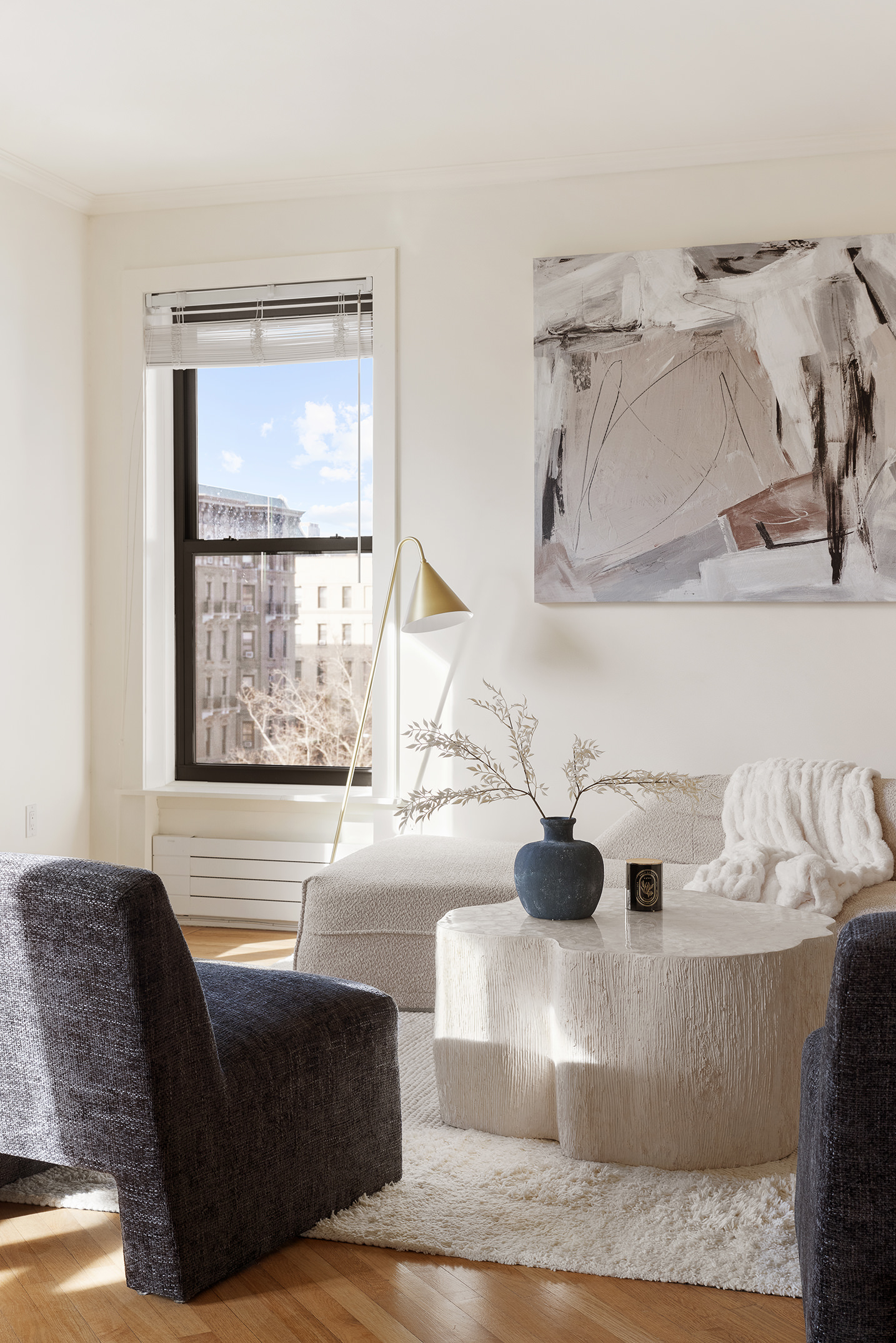 1845 Adam Clayton Powell Jr Boulevard, Unit 5C Manhattan, NY 10026 - Photo 16 of 17 a living room with furniture and a large window
