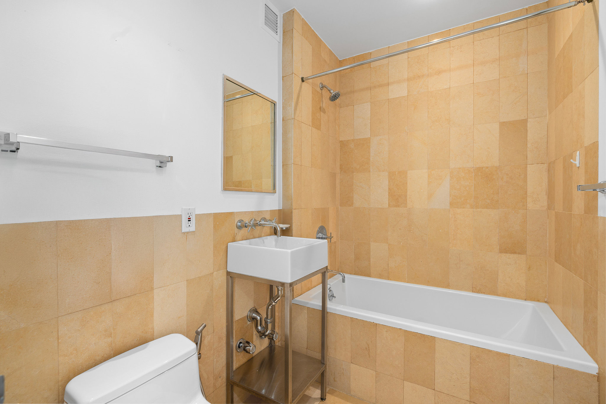 82 Guernsey Street, Unit 3B Brooklyn, NY 11222 - Photo 16 of 18 a bathroom with a sink a toilet and shower