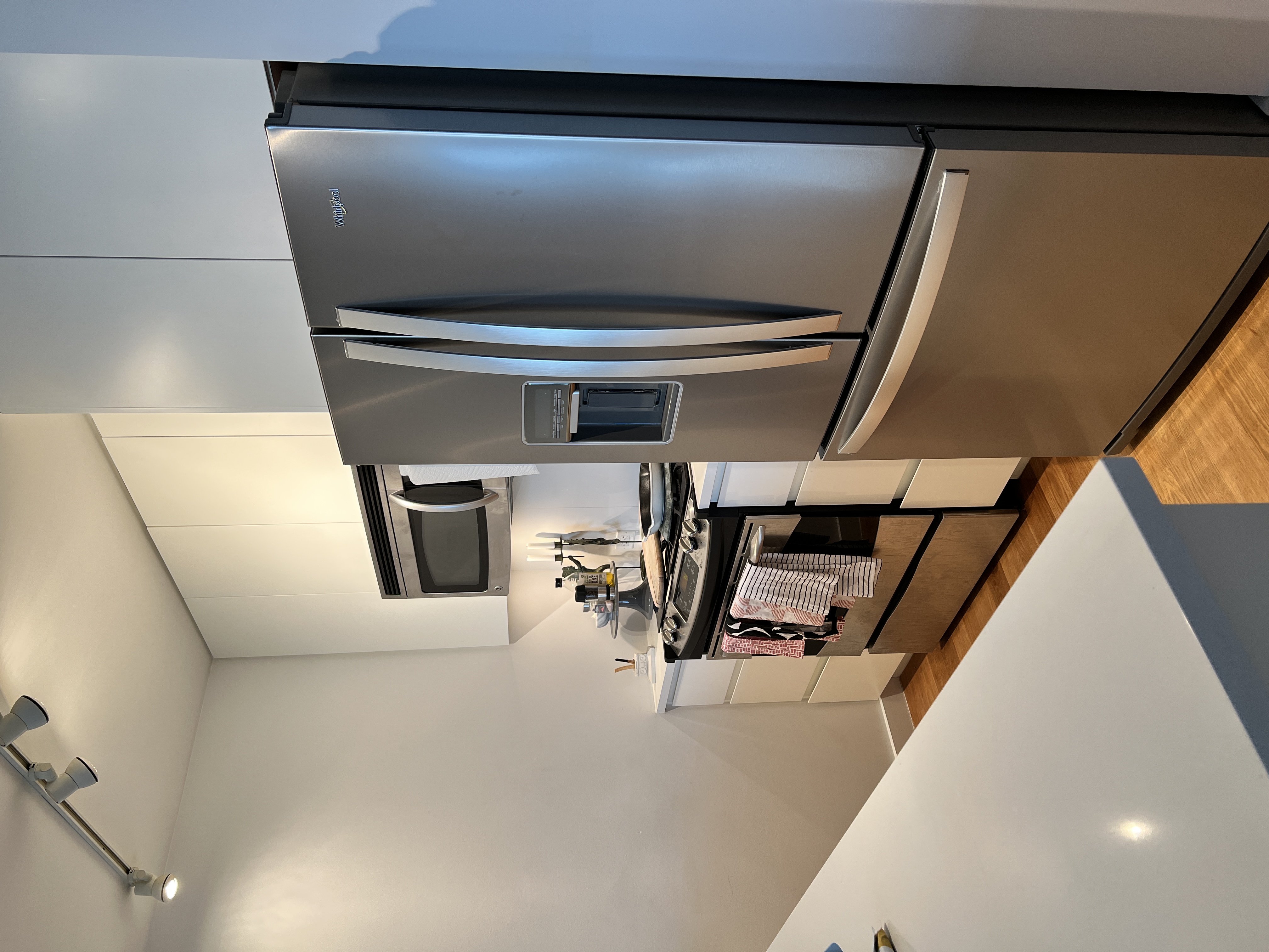 189 Schermerhorn Street, Unit PHC Brooklyn, NY 11201 - Photo 8 of 19 a kitchen with stainless steel appliances a refrigerator and a stove