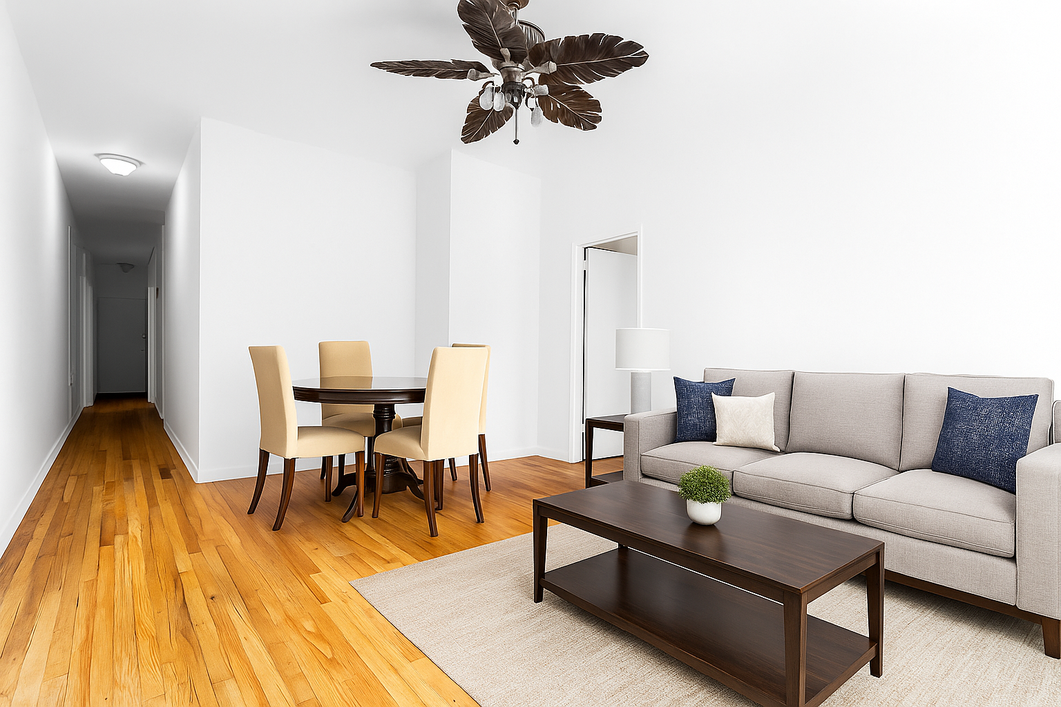 157 West 123rd Street, Unit 2A Manhattan, NY 10027 - Photo 4 of 16 a living room with furniture and a wooden floor