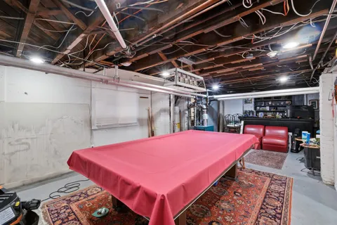 a bed room with a bed and a table