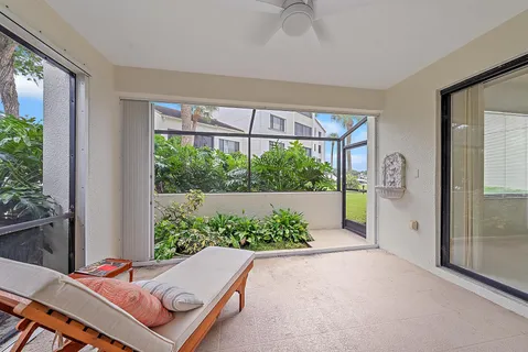 a room with furniture and a large window