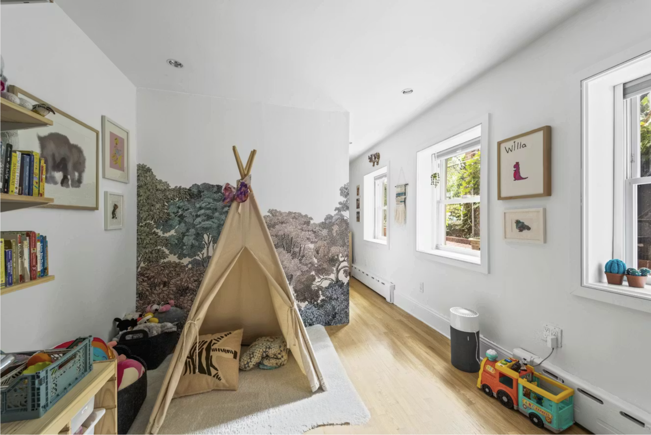 304 Warren Street, Unit 1 Brooklyn, NY 11201 - Photo 5 of 16 a view of a bedroom with baby crib and toys