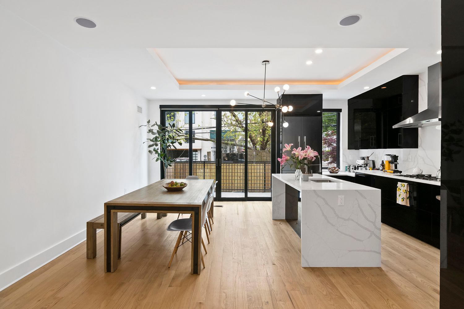 296 Fenimore Street Brooklyn, NY 11225 - Photo 5 of 19 a kitchen with stainless steel appliances kitchen island granite countertop a stove and cabinets