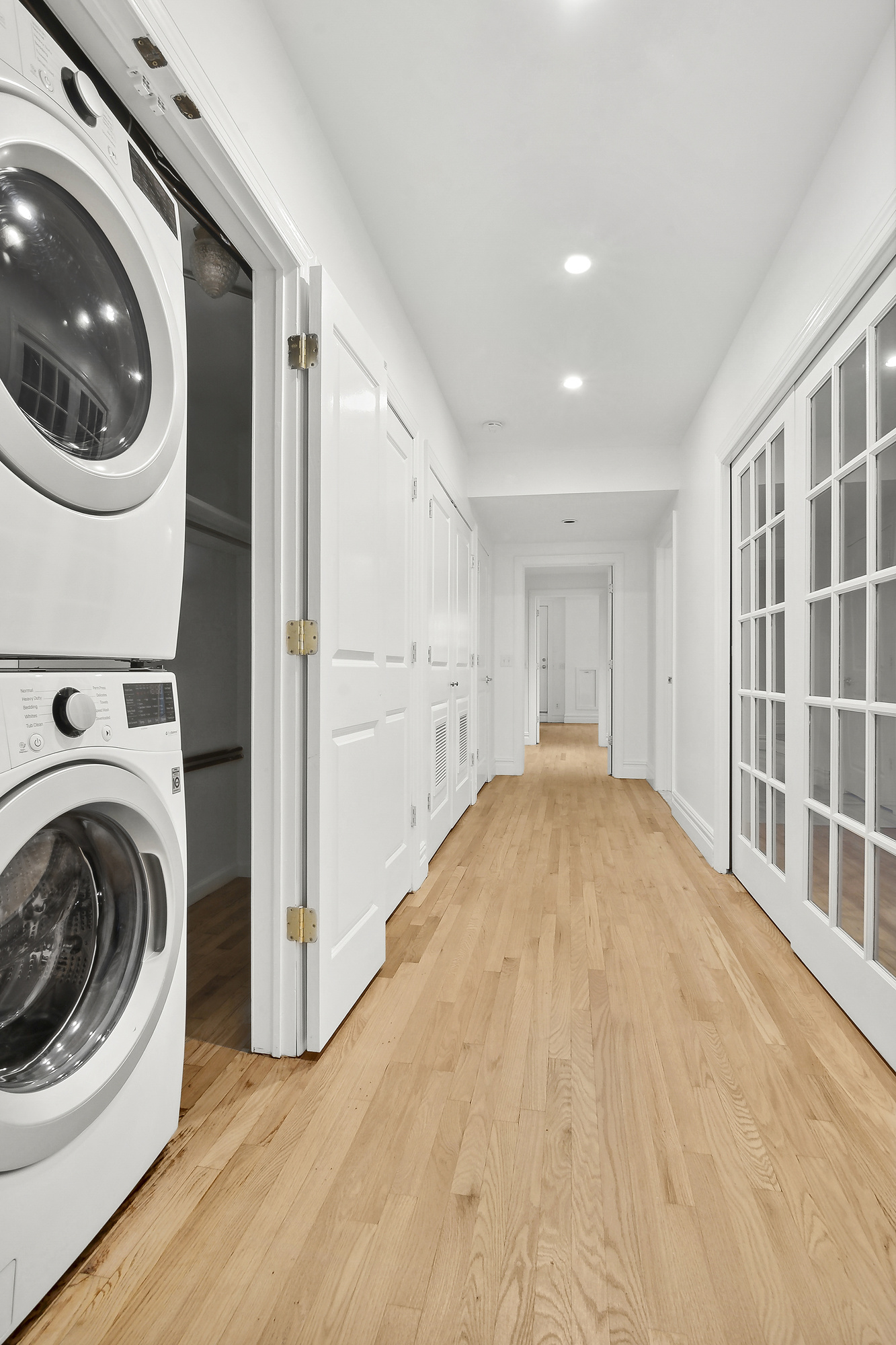 562 Washington Avenue, Unit 1 Brooklyn, NY 11238 - Photo 11 of 12 a view of a hallway with washer and dryer