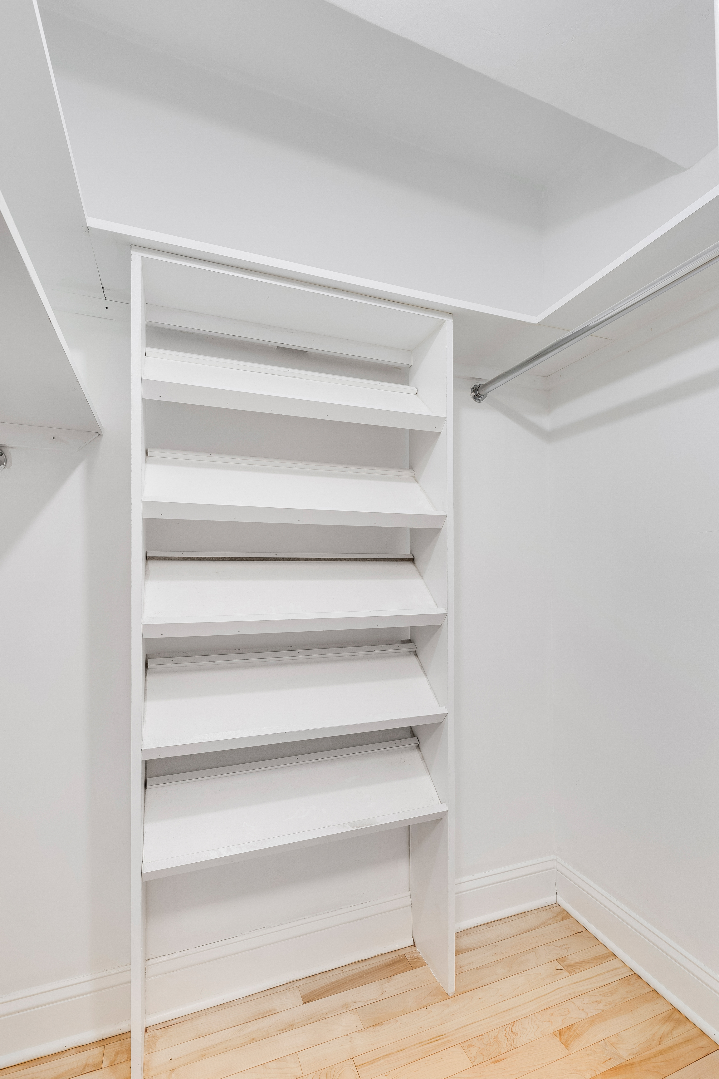 200 Central Park South, Unit 19K Manhattan, NY 10019 - Photo 9 of 14 a view of walk in closet with empty racks