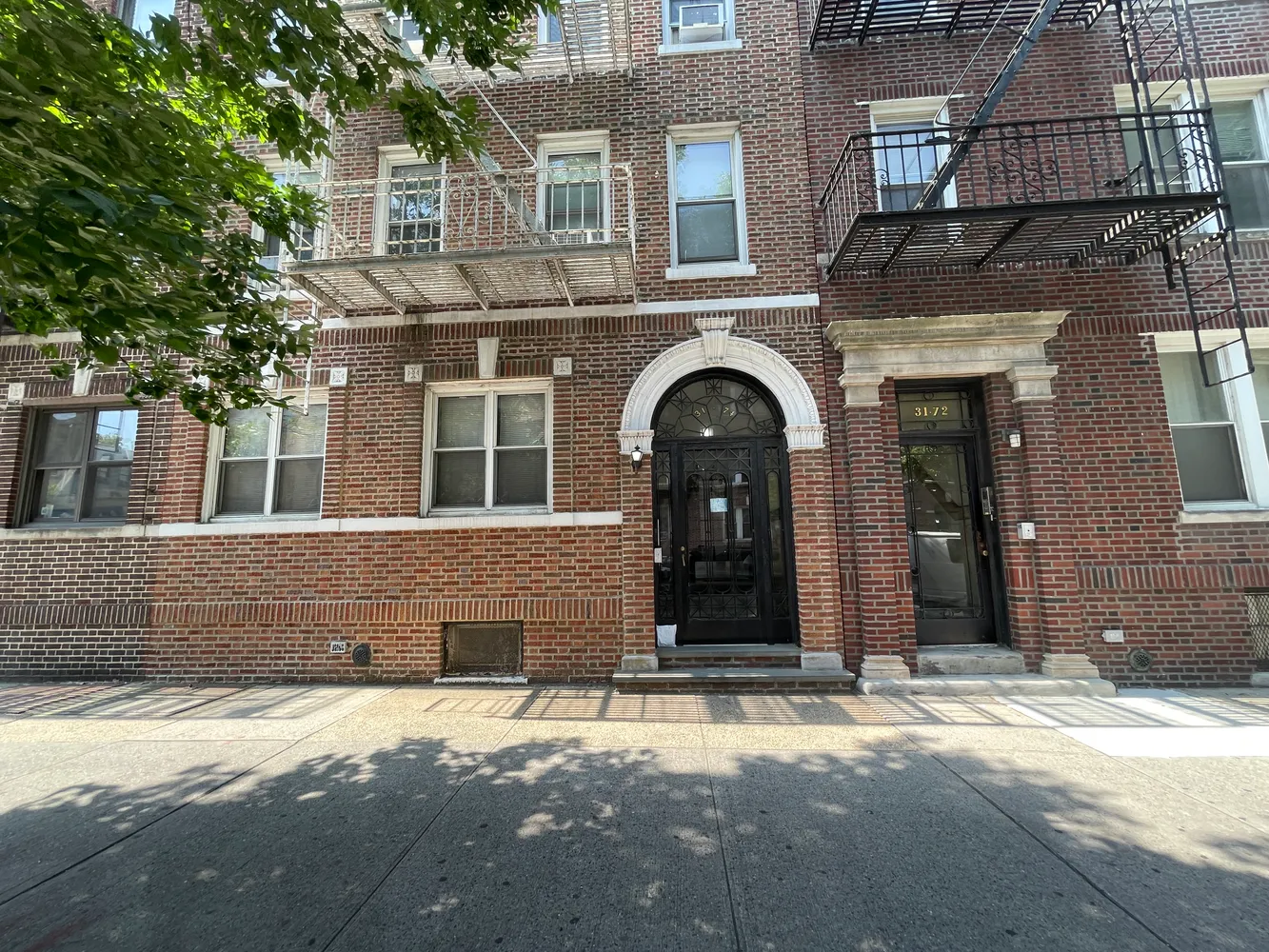 a front view of a house with a empty space