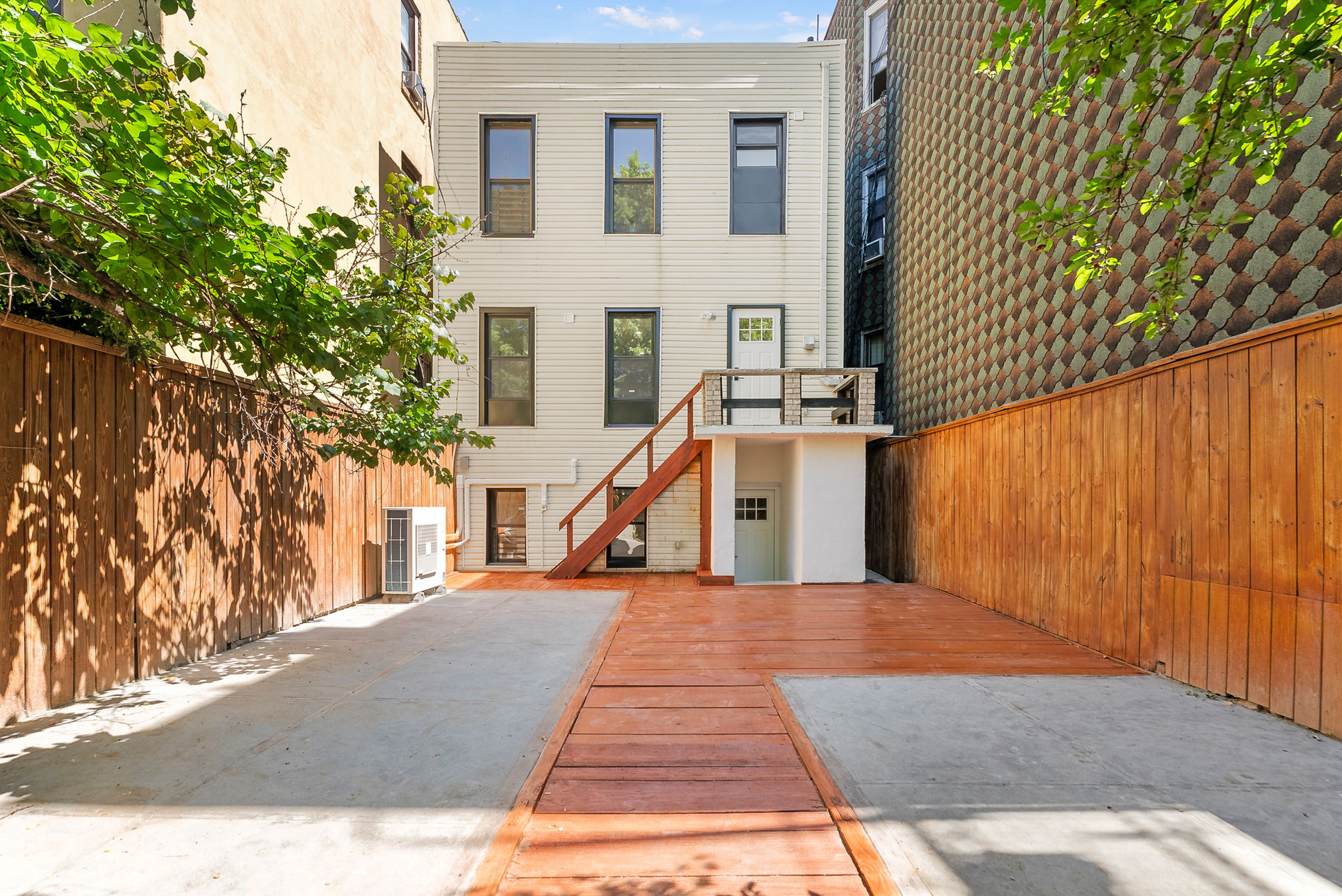 1414 30th Road Queens, NY 11102 - Photo 14 of 16 a view of a house with a park