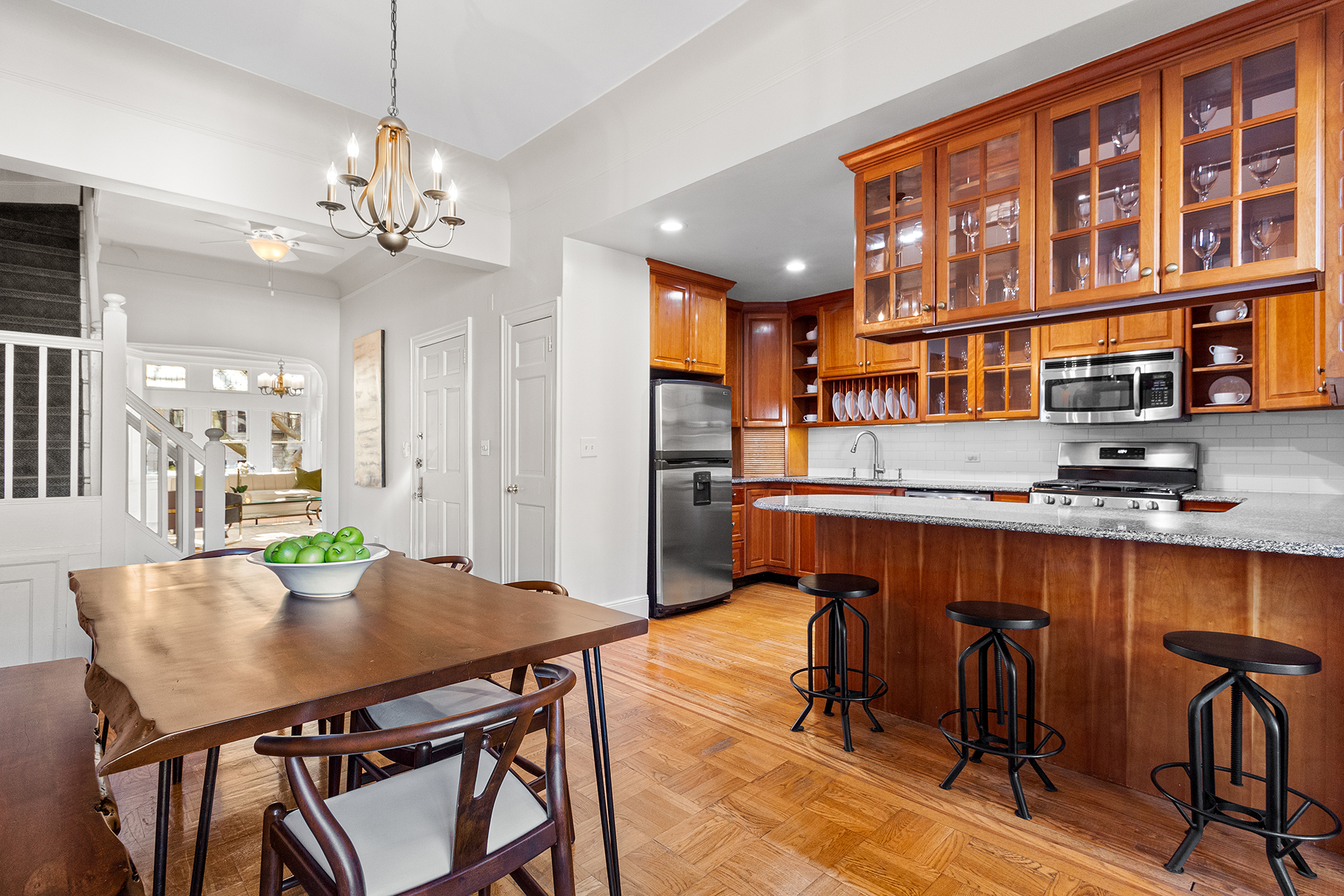 579 5th Street Brooklyn, NY 11215 - Photo 4 of 19 a view of a dining room with furniture and a chandelier