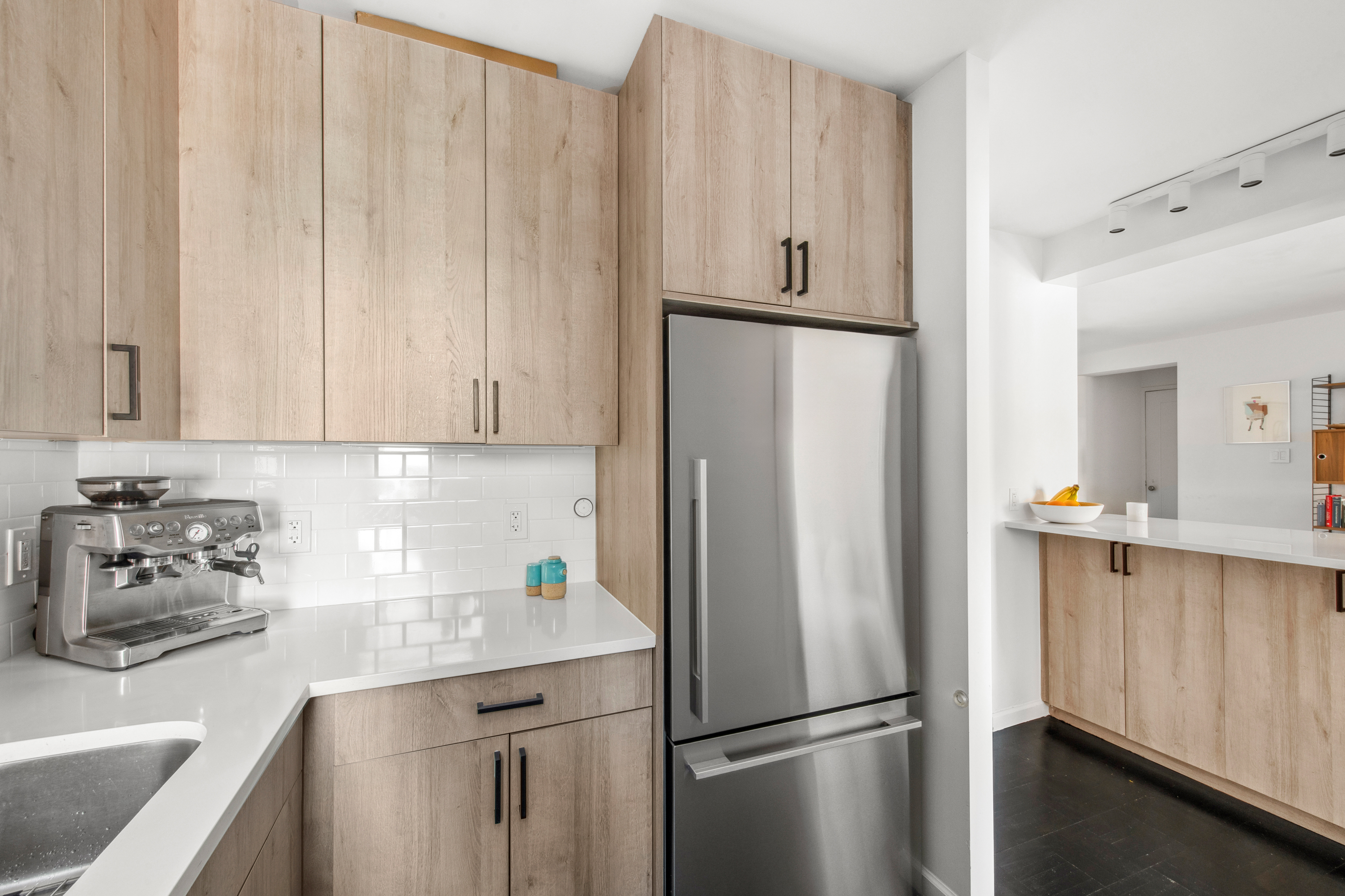 201 Clinton Avenue, Unit 10F Brooklyn, NY 11205 - Photo 7 of 11 a kitchen with appliances and cabinets