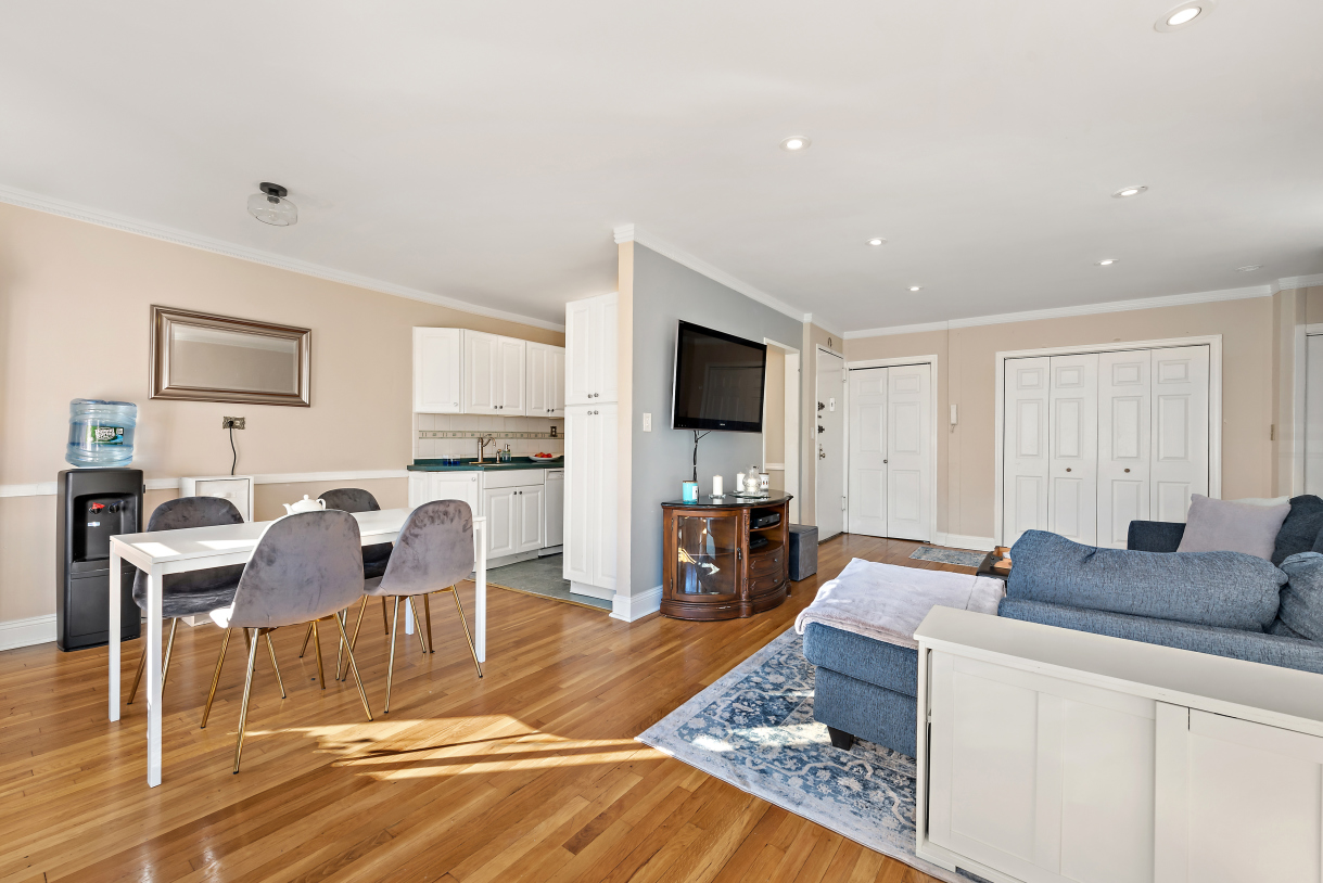 5730 Mosholu Avenue, Unit 4F Bronx, NY 10471 - Photo 5 of 15 a living room with furniture and a flat screen tv