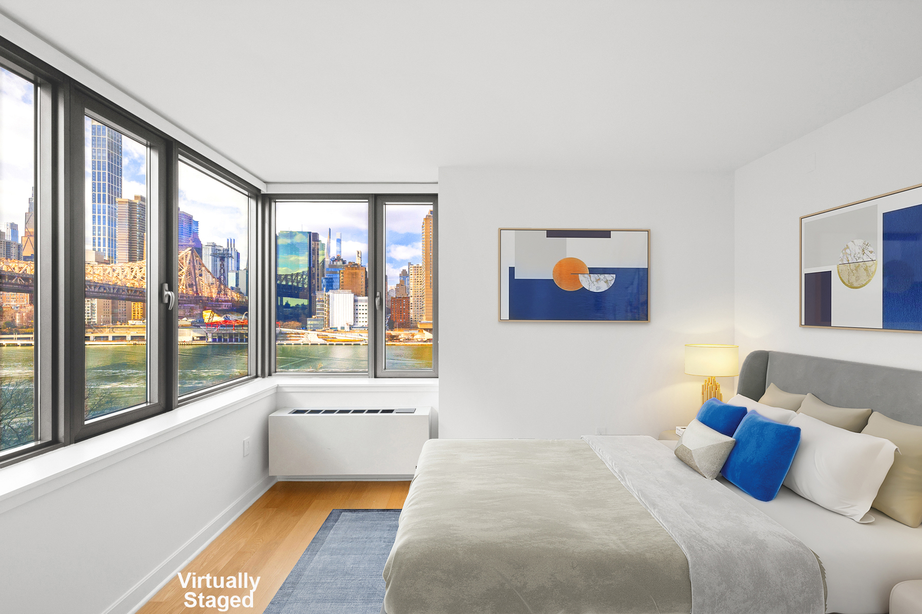 a bedroom with a large bed and a large window