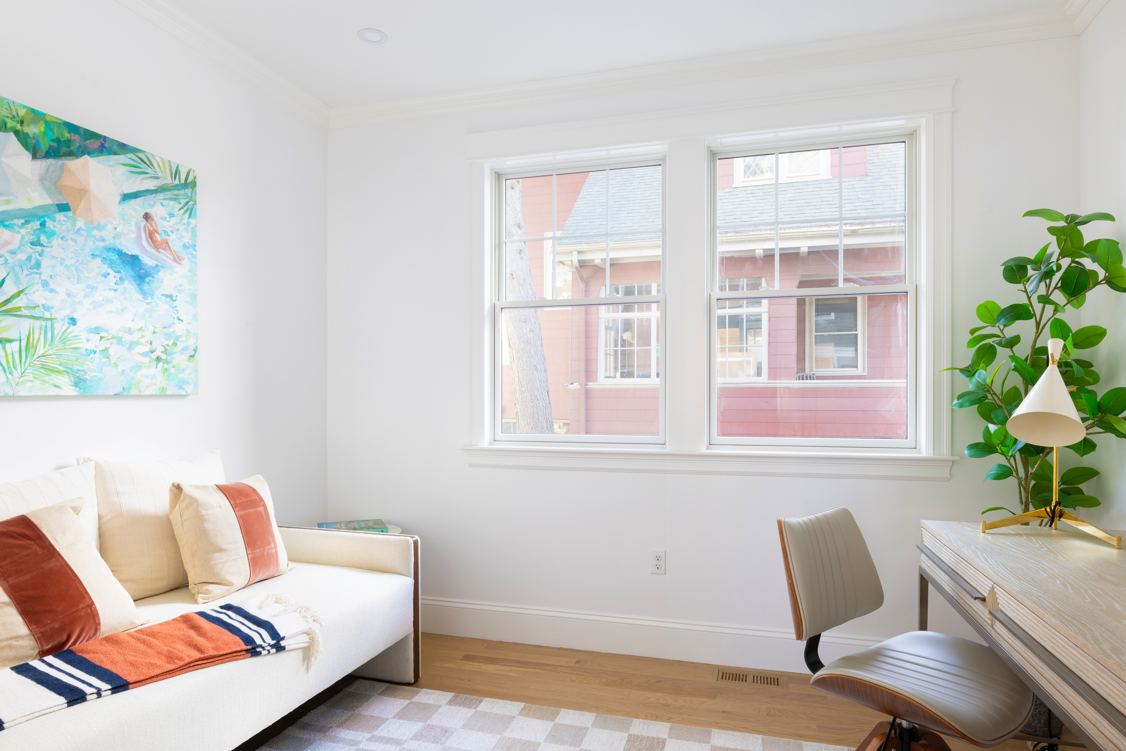 85 Naples Road Brookline, MA 02446 - Photo 12 of 36 a living room with furniture and a potted plant