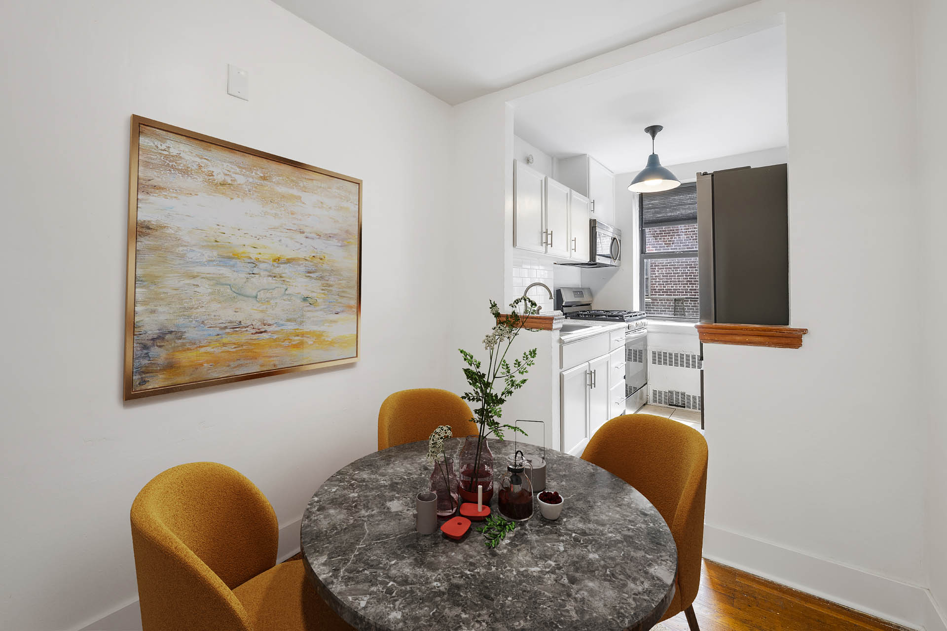 2420 Morris Avenue, Unit 6K Bronx, NY 10468 - Photo 5 of 7 a living room with furniture and wooden floor