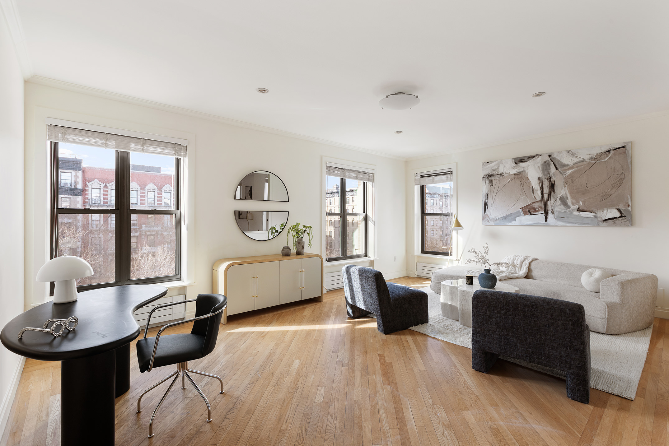 1845 Adam Clayton Powell Jr Boulevard, Unit 5C Manhattan, NY 10026 - Photo 3 of 17 a bedroom with furniture and a window