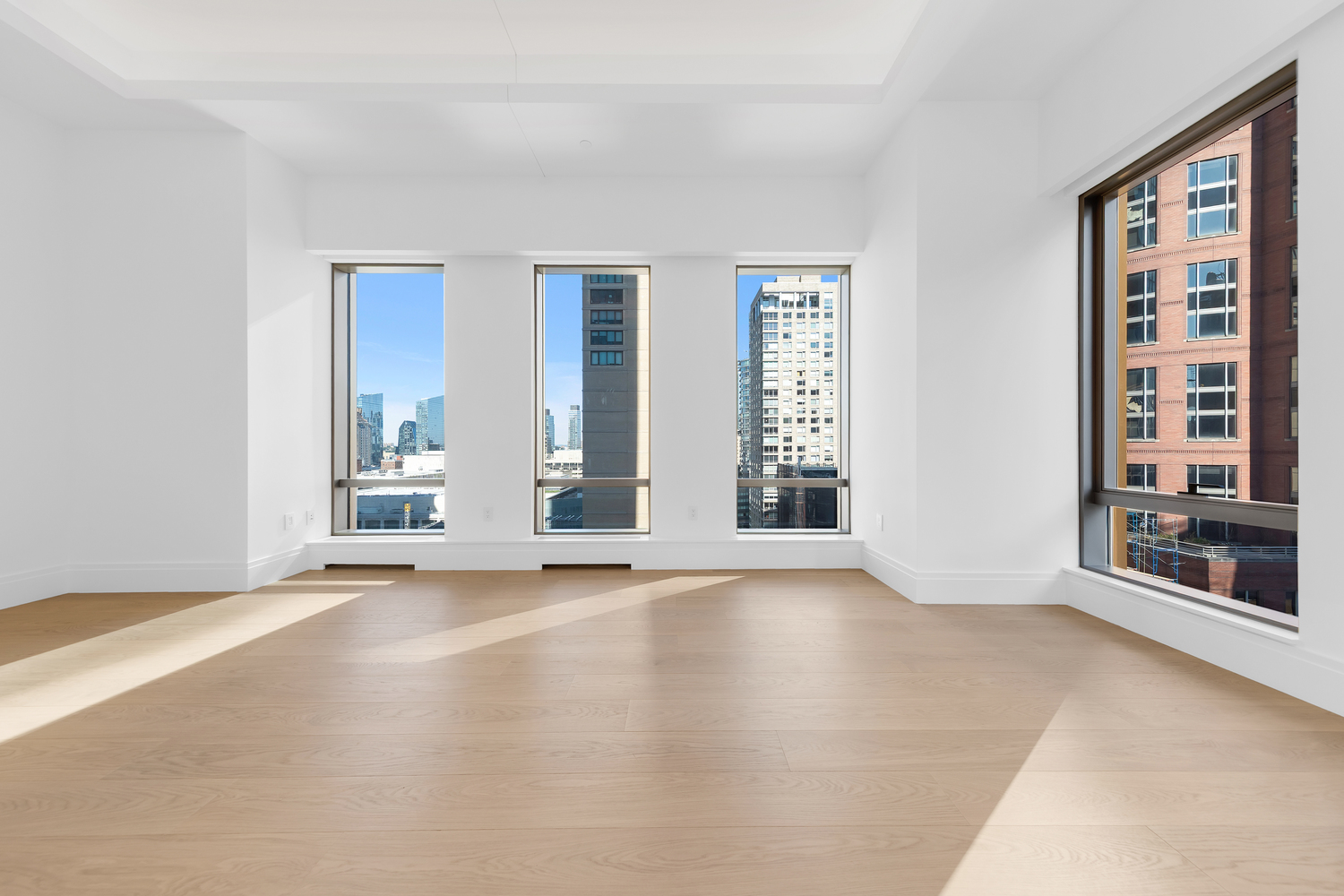 50 West 66th Street, Unit 17A Manhattan, NY 10023 - Photo 3 of 49 an empty room with windows