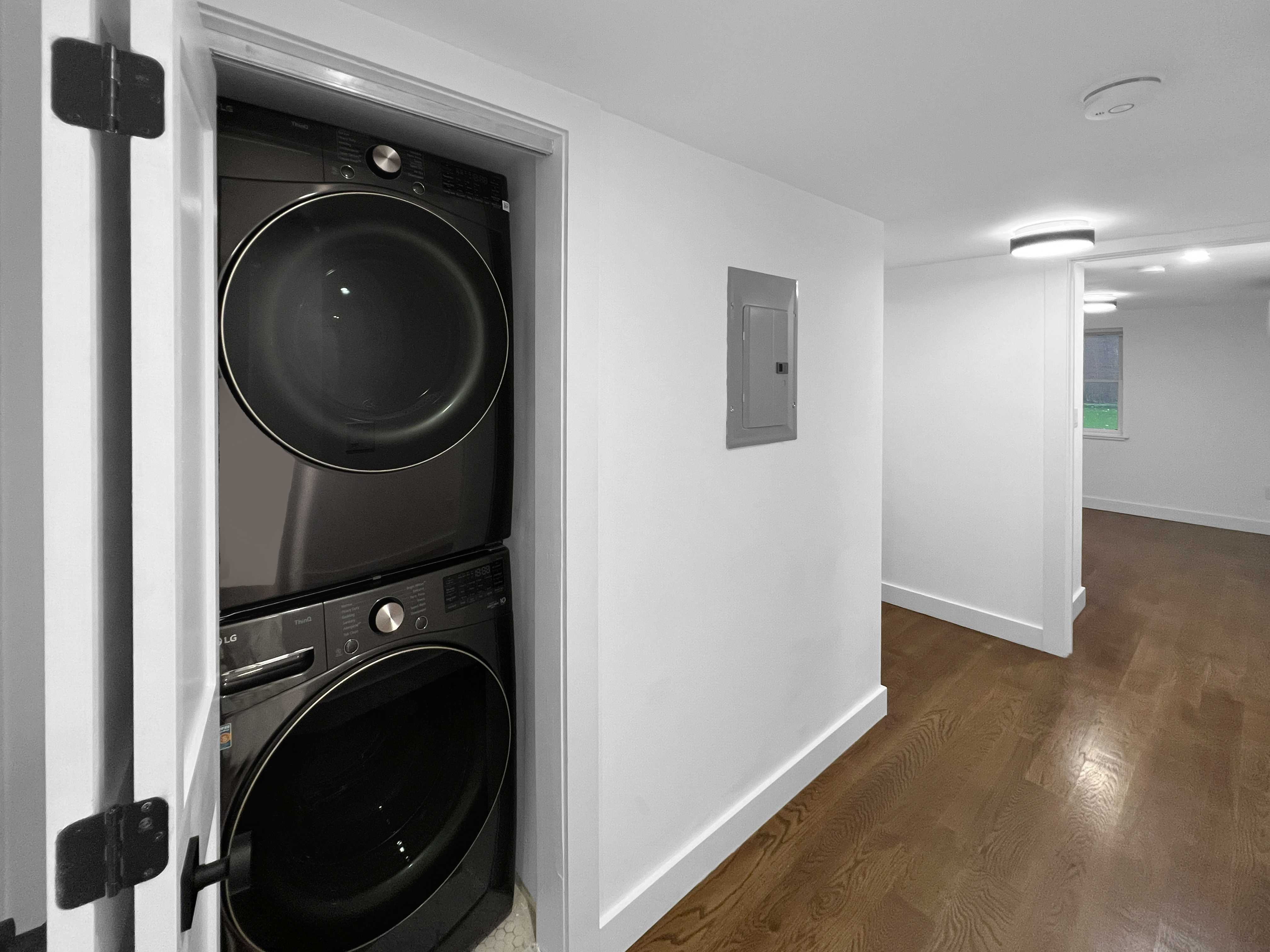 352 Degraw Street, Unit 1 Brooklyn, NY 11231 - Photo 14 of 20 a view of a hallway with washer and dryer