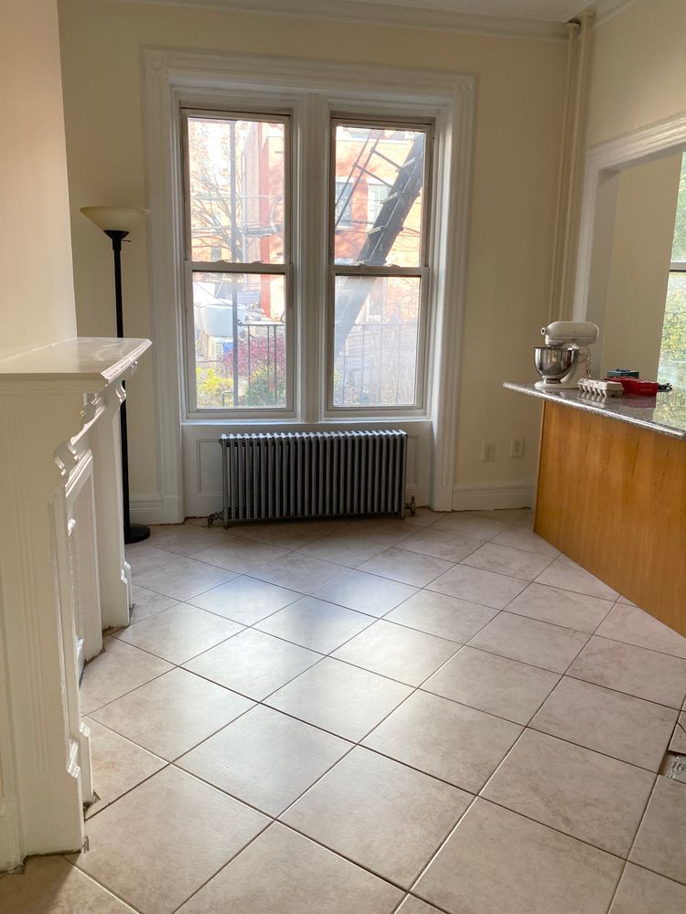 23 Saint Marks Avenue, Unit 3 Brooklyn, NY 11217 - Photo 9 of 10 a room with a washing machine and a window
