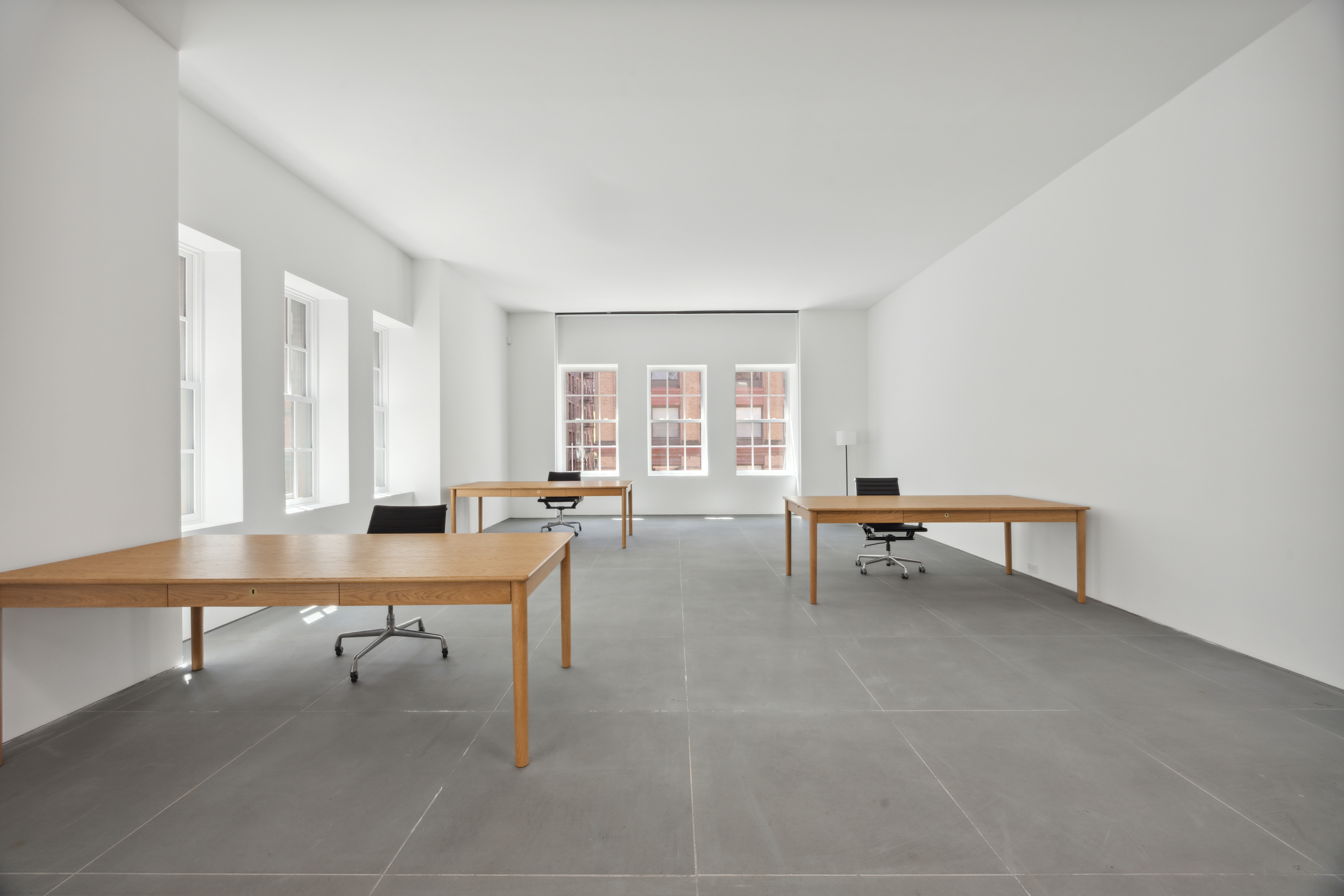 9 Jay Street Manhattan, NY 10013 - Photo 12 of 32 a view of a workspace with furniture and a window