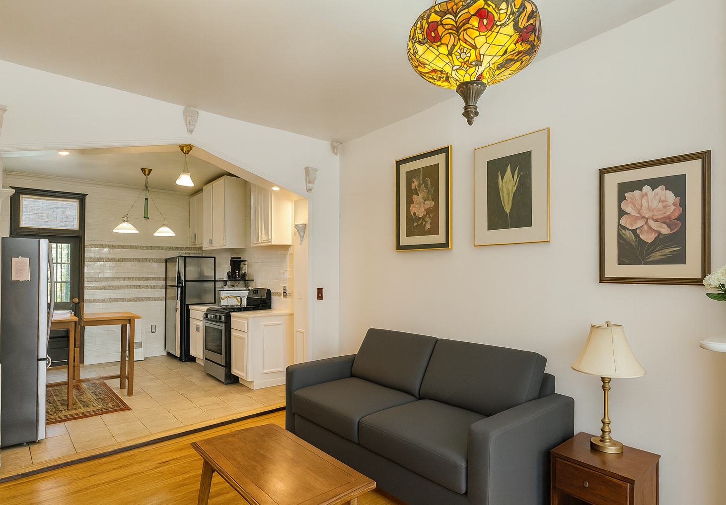 545 A Lafayette Avenue, Unit 2 Brooklyn, NY 11205 - Photo 2 of 7 a living room with furniture and a kitchen view