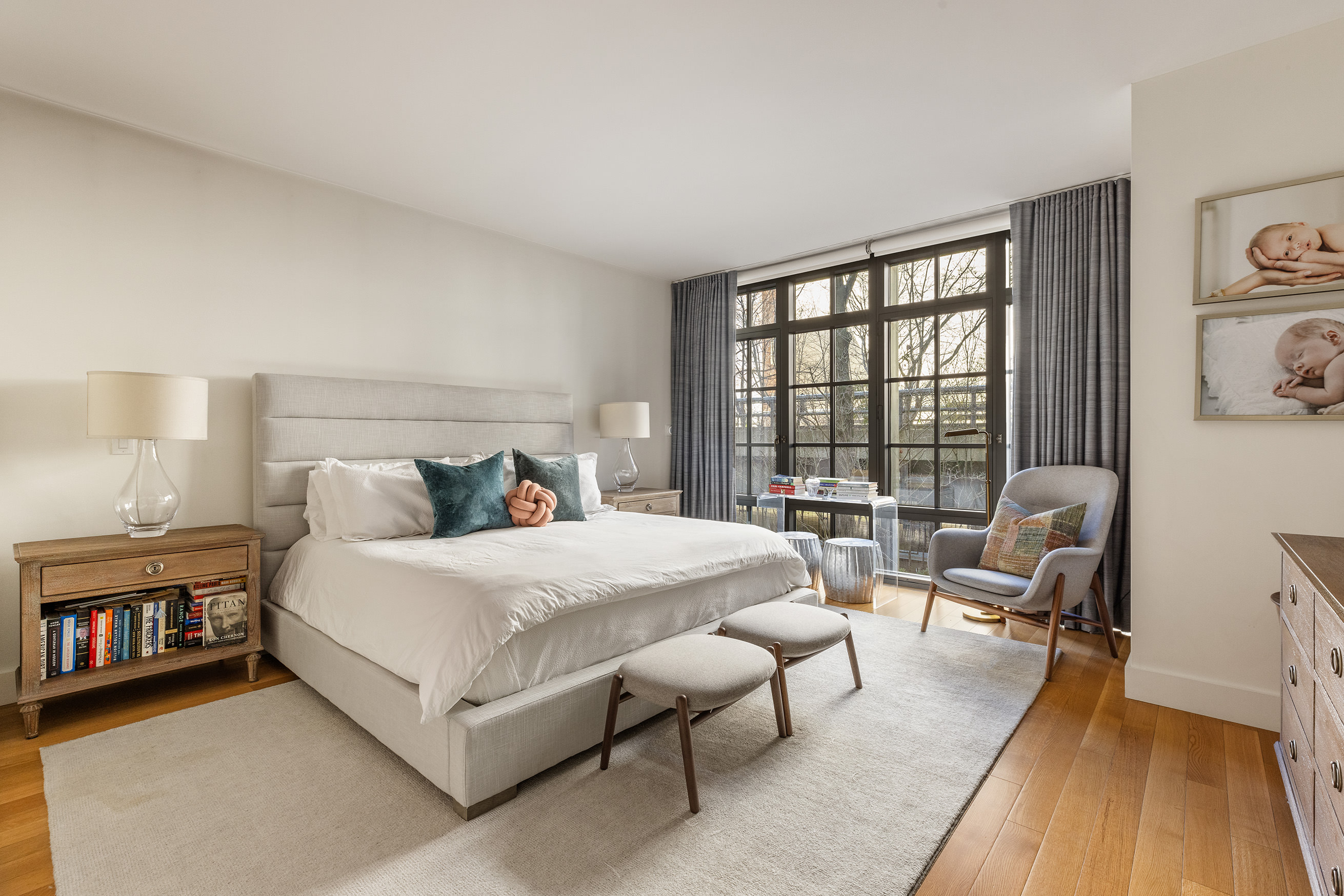 500 West 21st Street, Unit 3A Manhattan, NY 10011 - Photo 6 of 11 a spacious bedroom with a bed and a large window