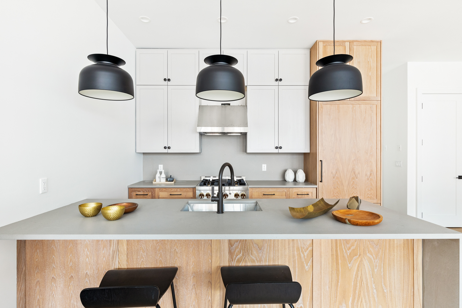 243 North 5th Street, Unit 2B Brooklyn, NY 11211 - Photo 6 of 14 a kitchen with a sink a stove and a wooden floor