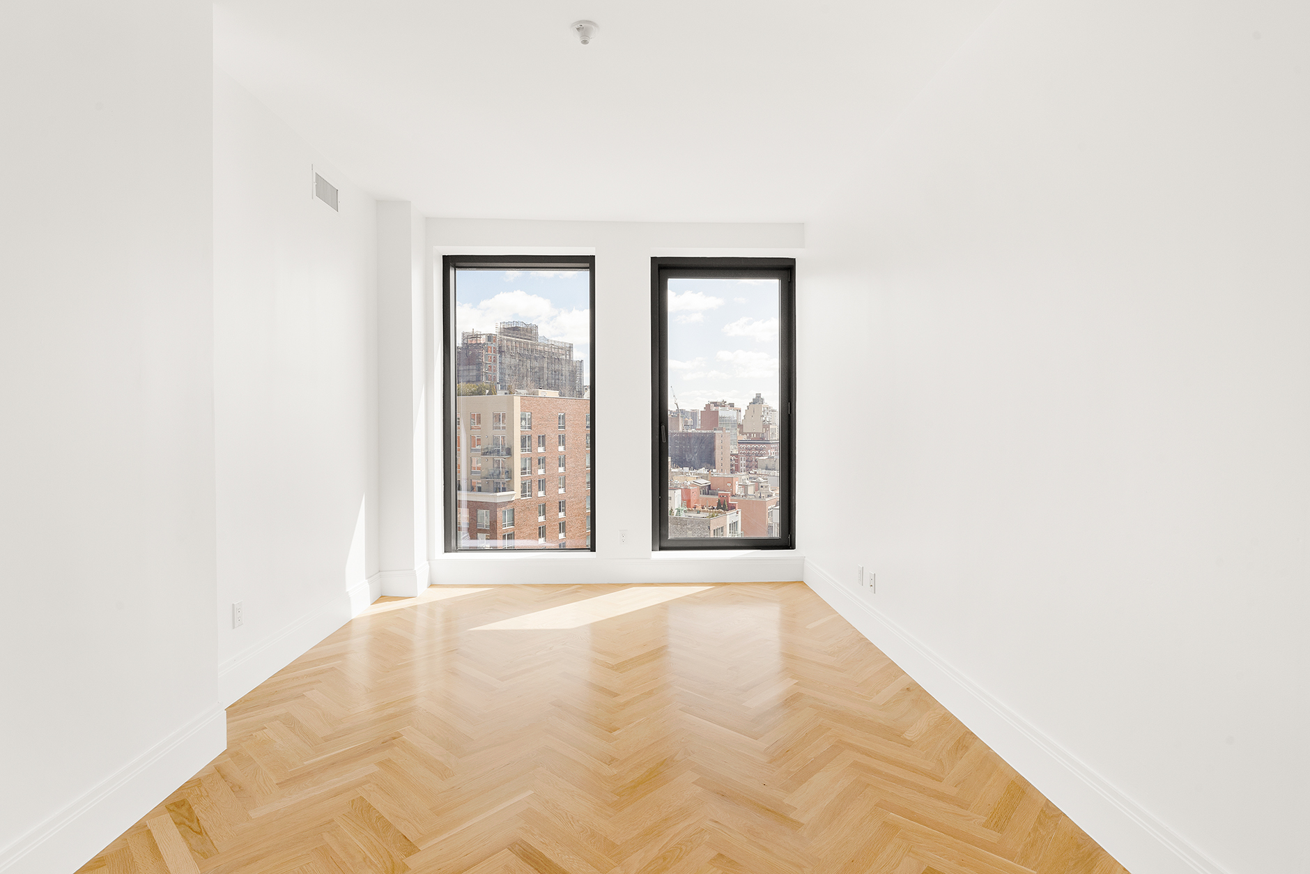 300 West 122nd Street, Unit 12C Manhattan, NY 10027 - Photo 2 of 11 a view of an empty room with a window