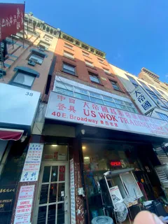 a view of a building with sitting area