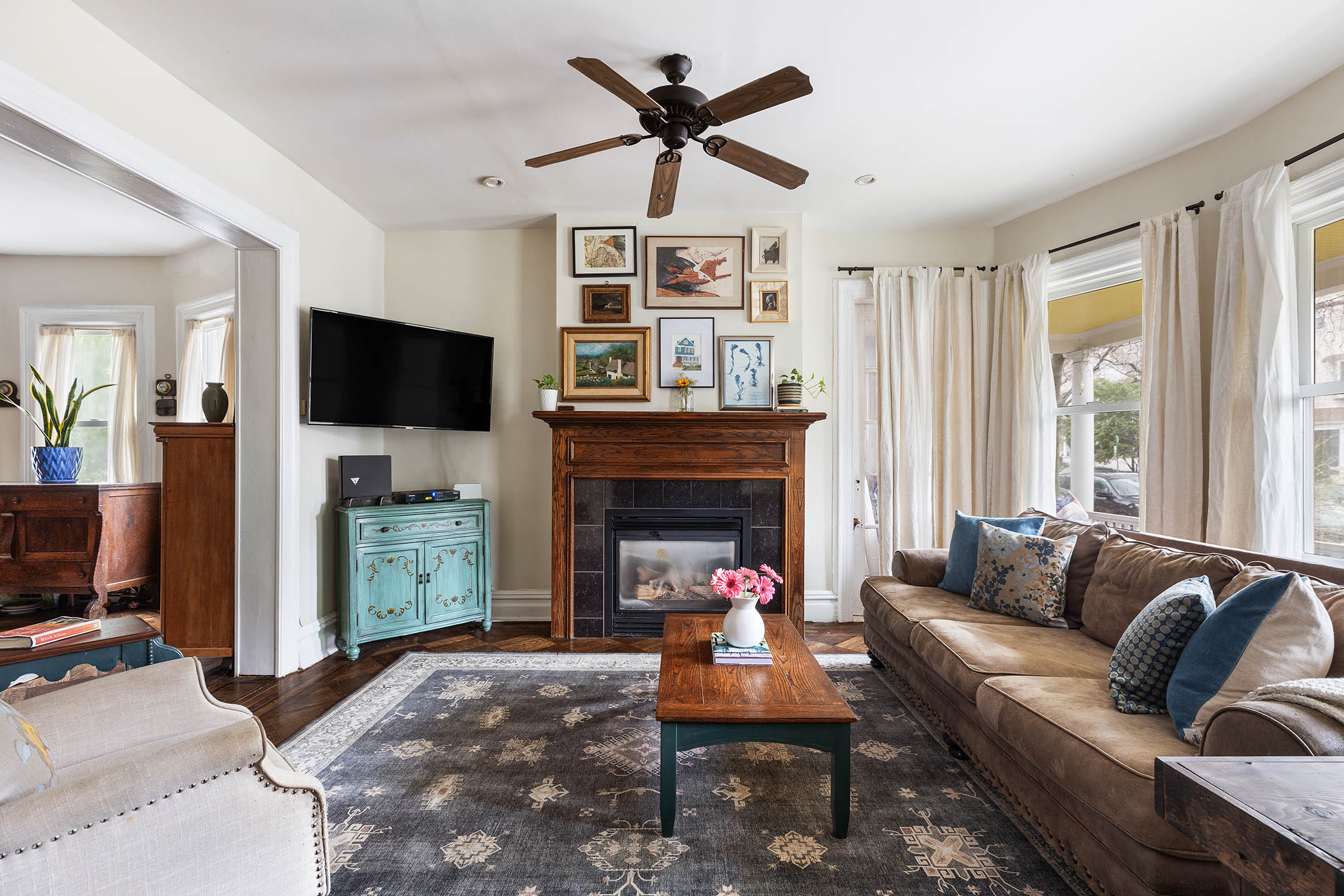 267 Marlborough Road Brooklyn, NY 11226 - Photo 3 of 14 a living room with furniture a fireplace and a flat screen tv