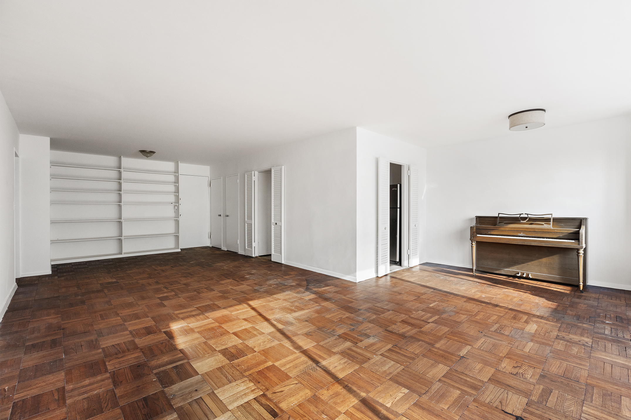 530 East 72nd Street, Unit 3C Manhattan, NY 10021 - Photo 7 of 10 a view of empty room with a fireplace