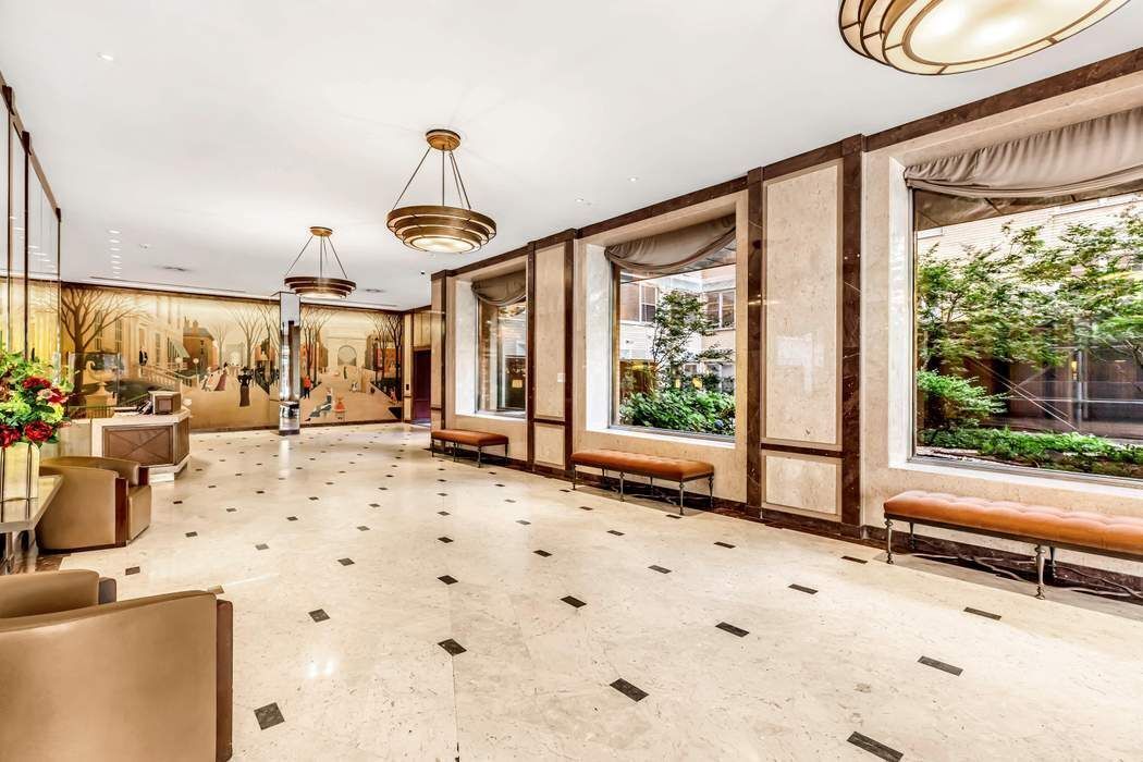 20 East 9th Street, Unit 22C Manhattan, NY 10003 - Photo 13 of 21 a very nice looking room with a large window