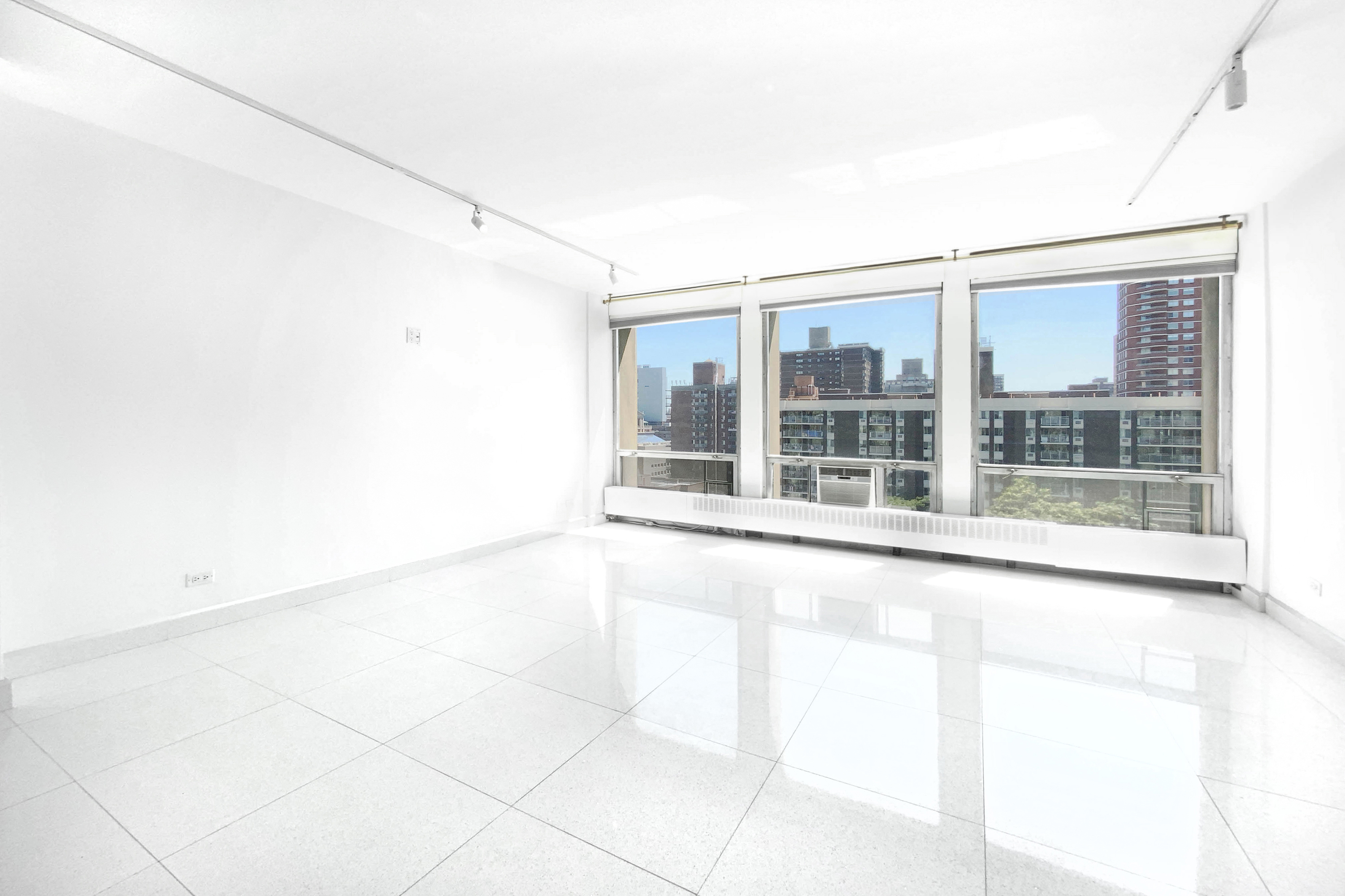 333 East 30th Street, Unit 12H Manhattan, NY 10016 - Photo 2 of 15 a view of an empty room with a window