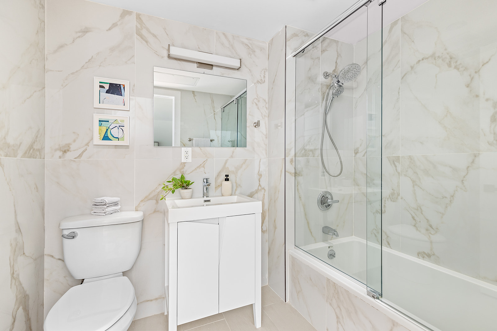 40 Schaefer Street, Unit 3R Brooklyn, NY 11207 - Photo 5 of 8 a bathroom with a sink toilet and shower