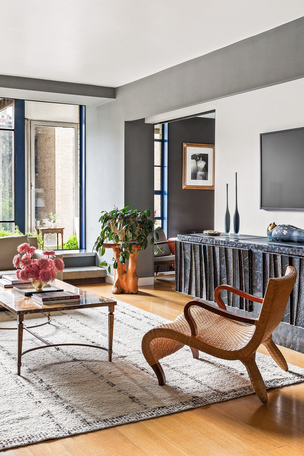 37 West 12th Street, Unit 6G Manhattan, NY 10011 - Photo 3 of 17 a living room with furniture and a flat screen tv